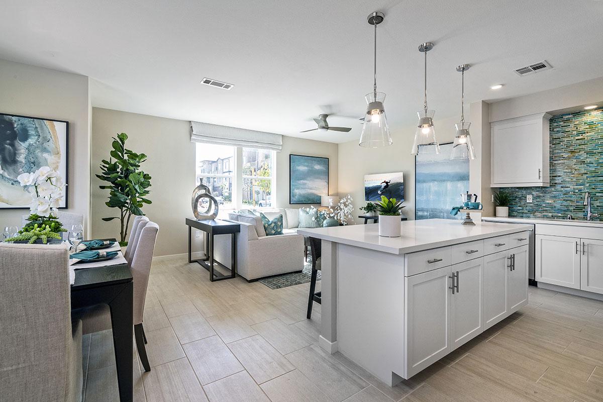 a kitchen with a lot of furniture in a room