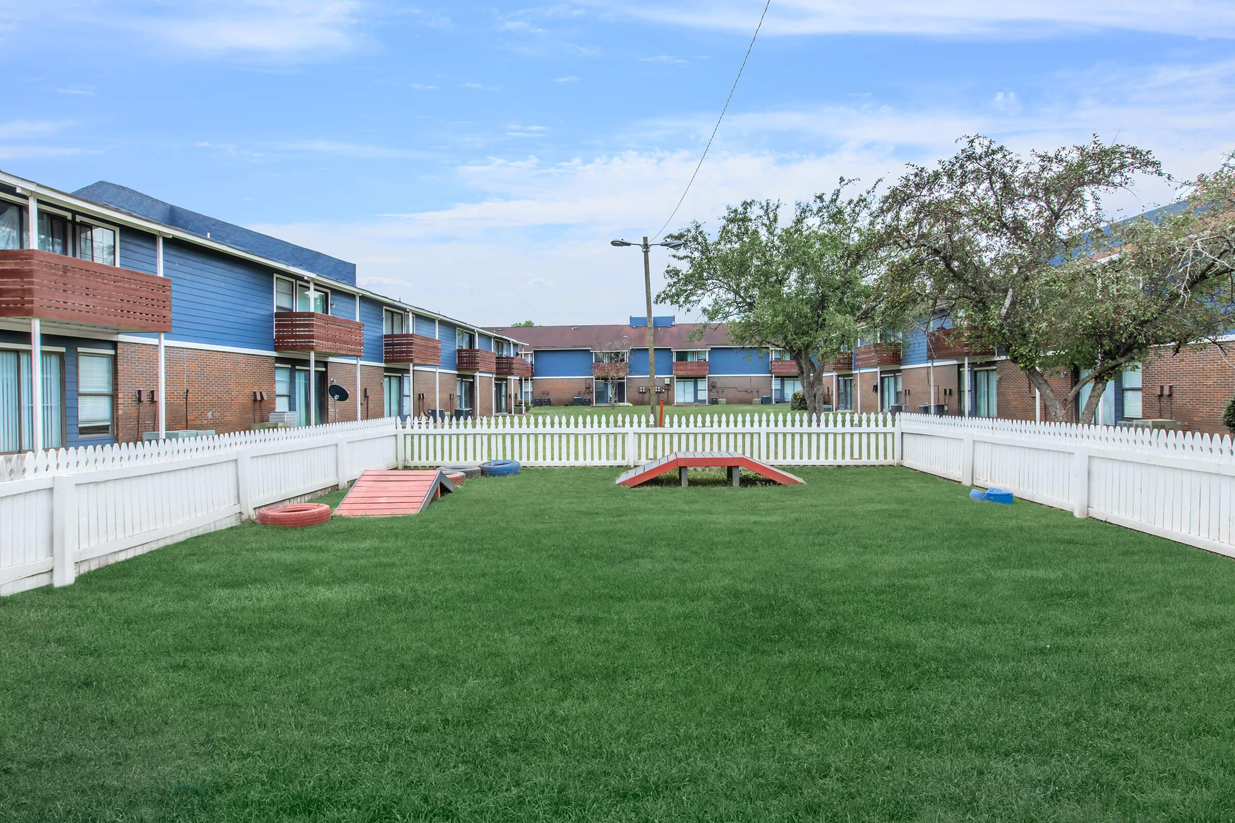 a large lawn in front of a building