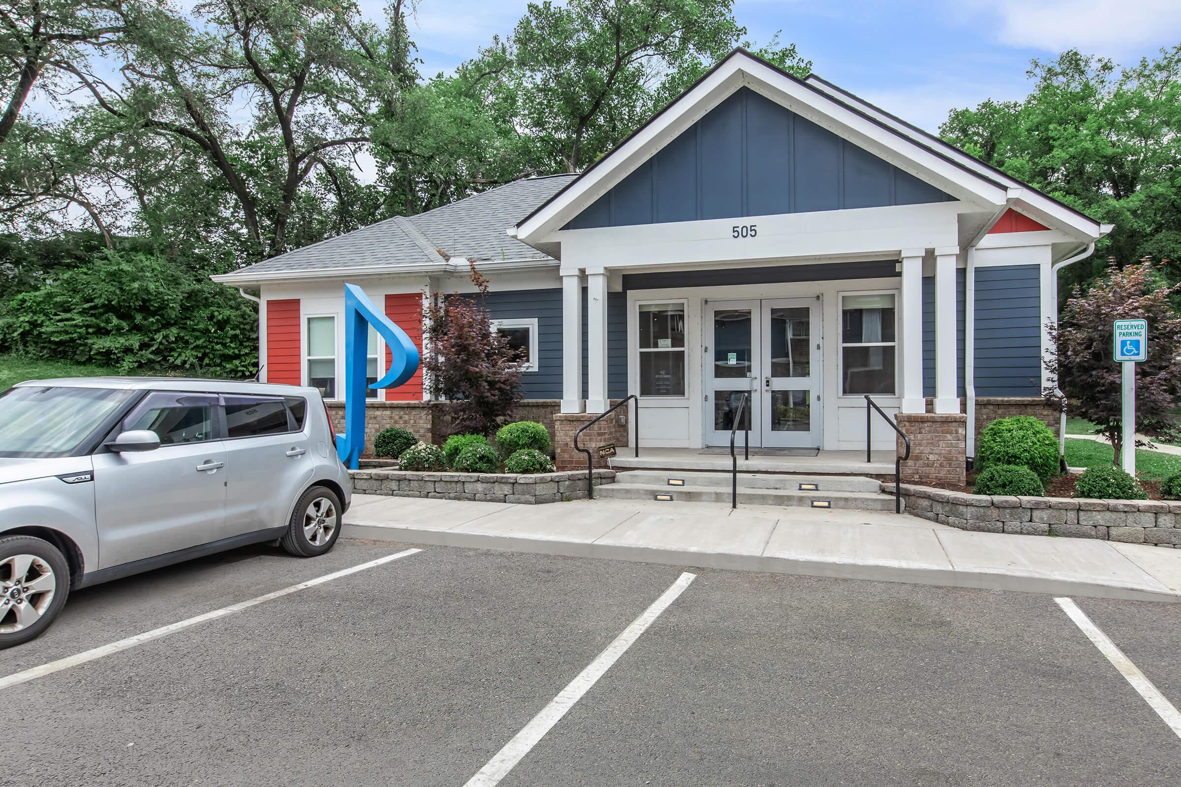 a car parked in front of a house