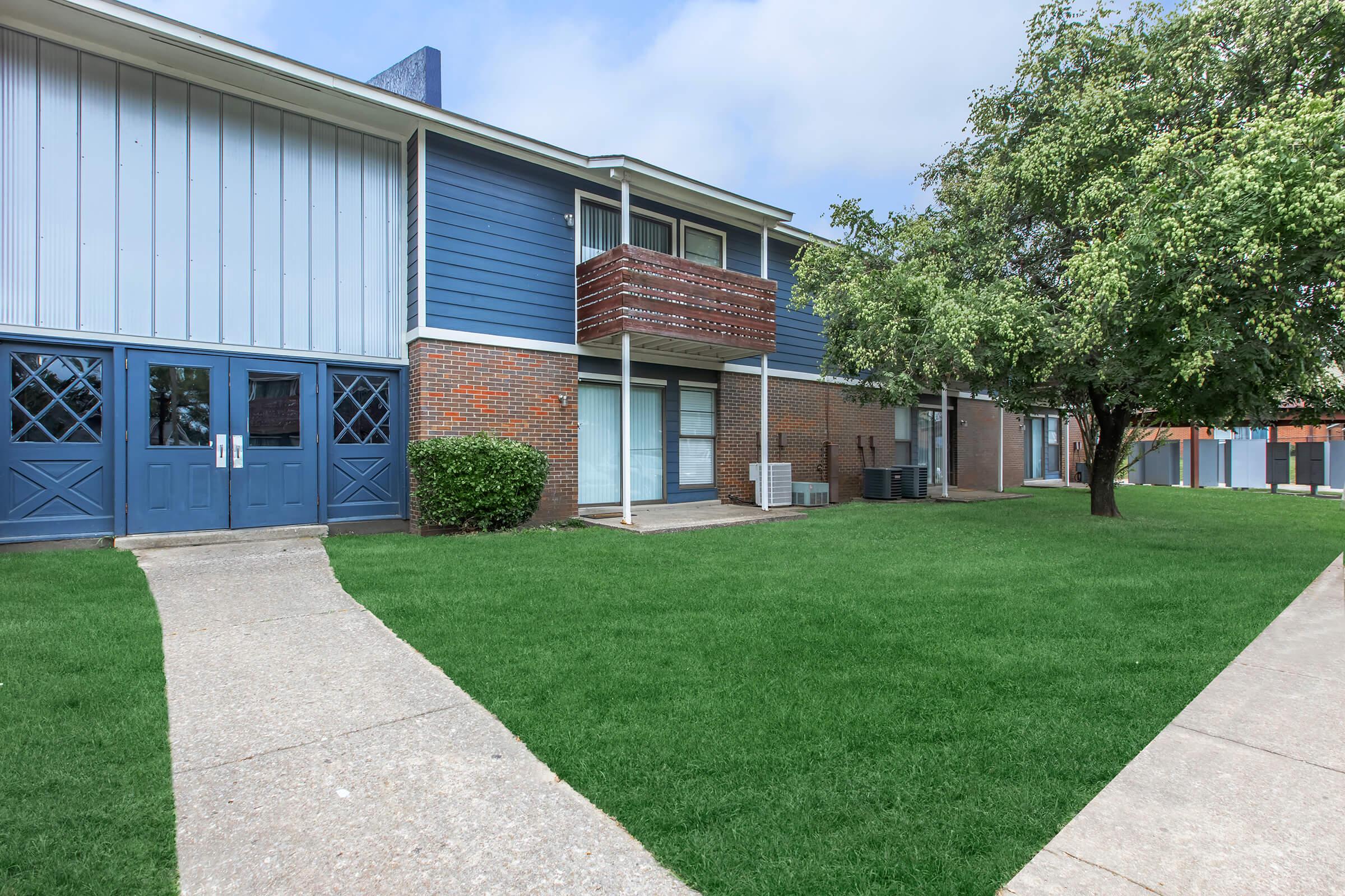 a large lawn in front of a house