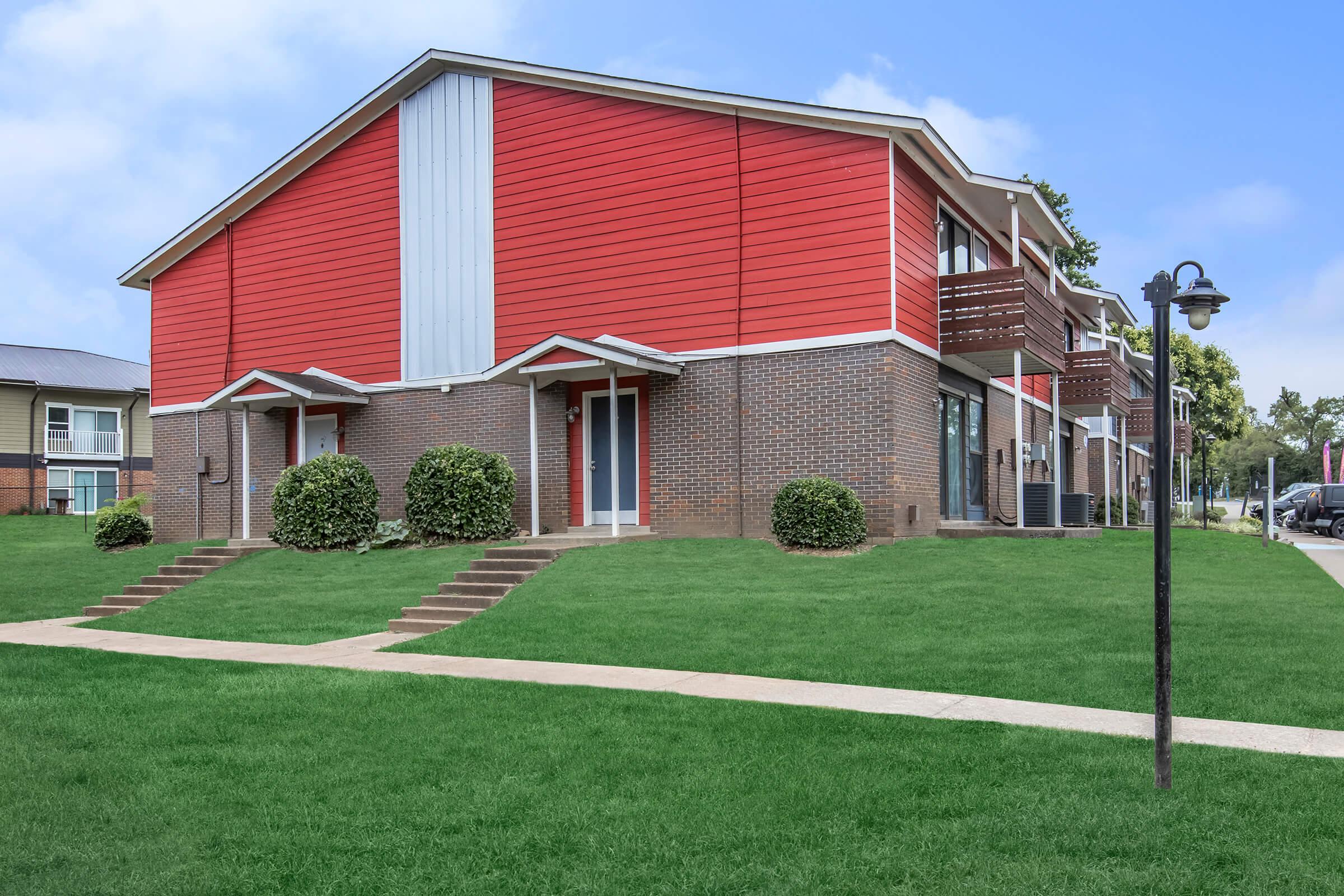 a large lawn in front of a house