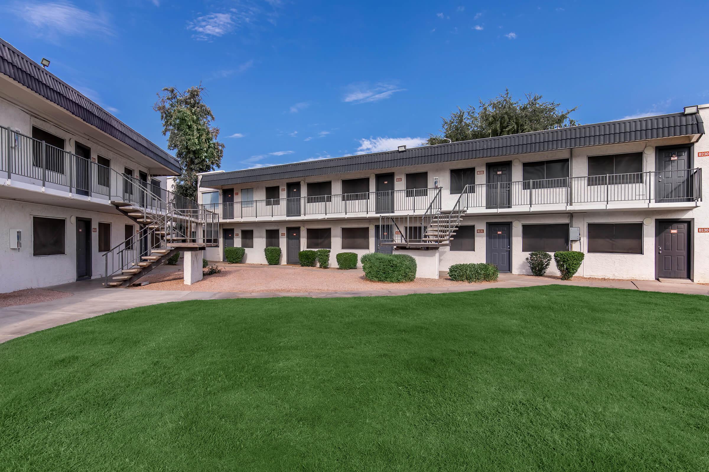 a large lawn in front of a house