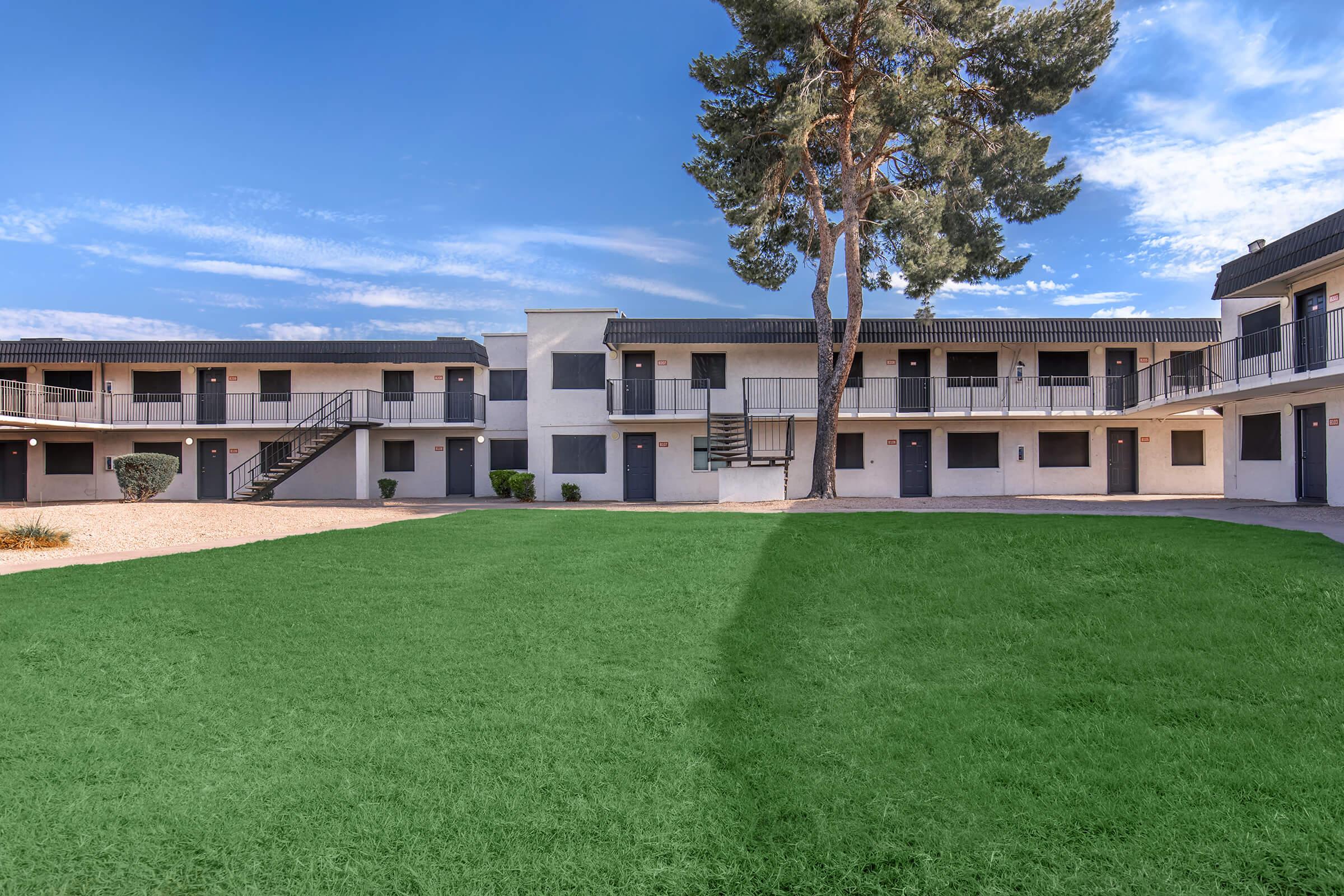 a large lawn in front of a building