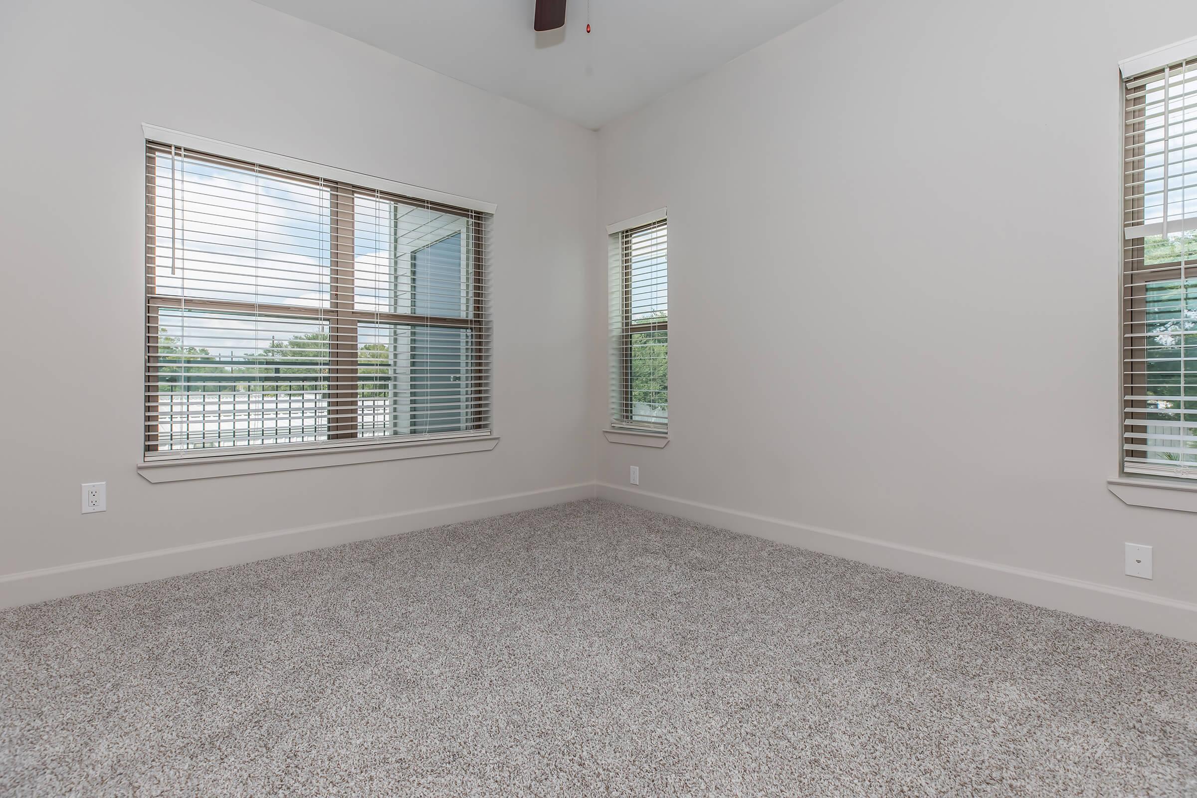 a living room next to a window