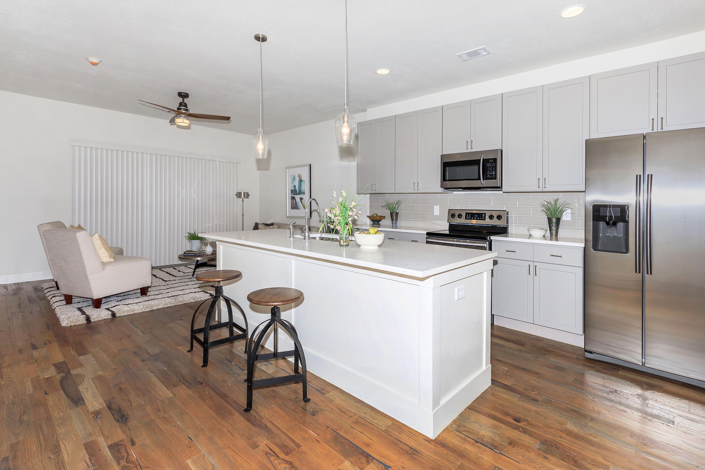 a kitchen with a table in a room