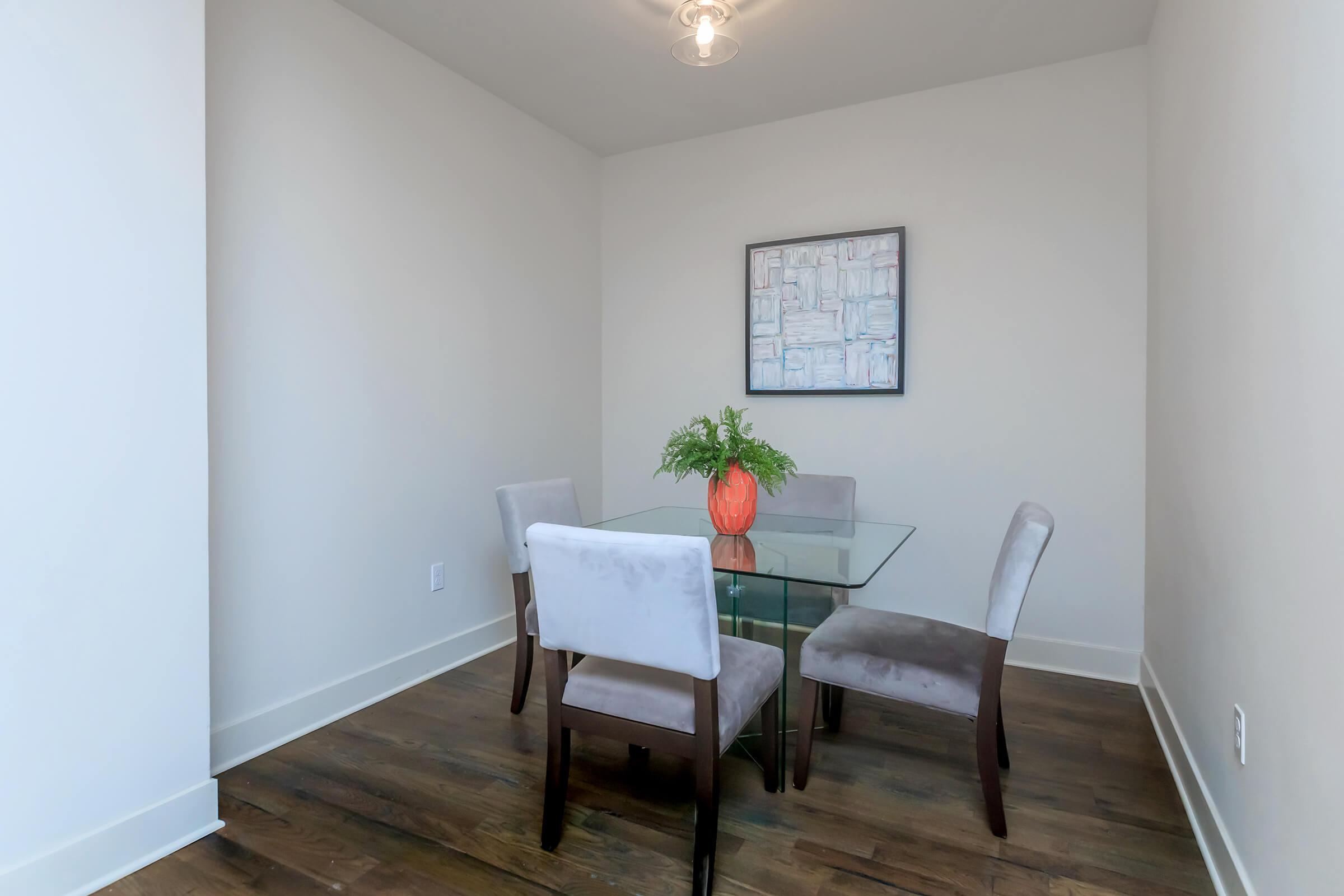 a living room with a wood floor