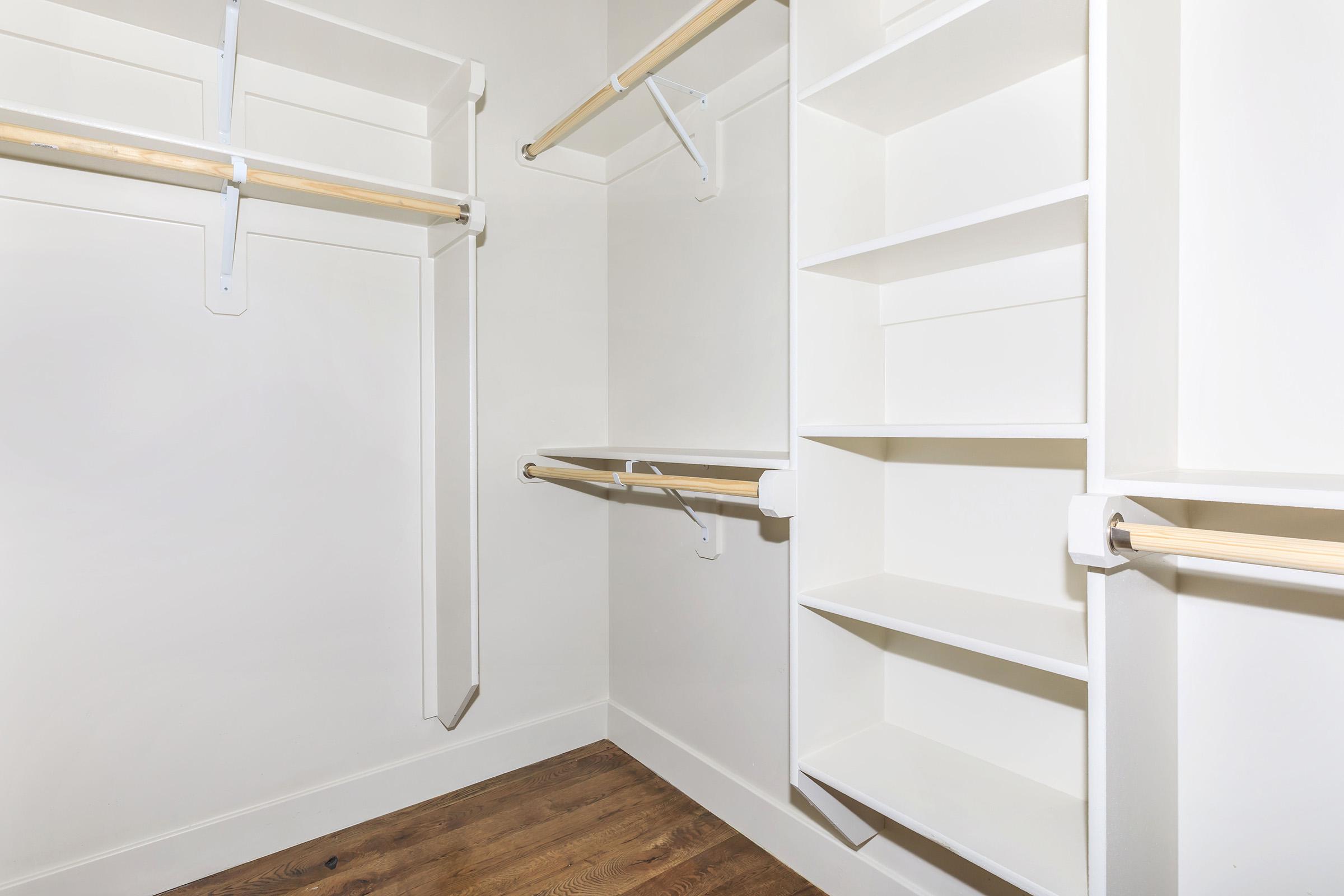 a white refrigerator freezer sitting in a room