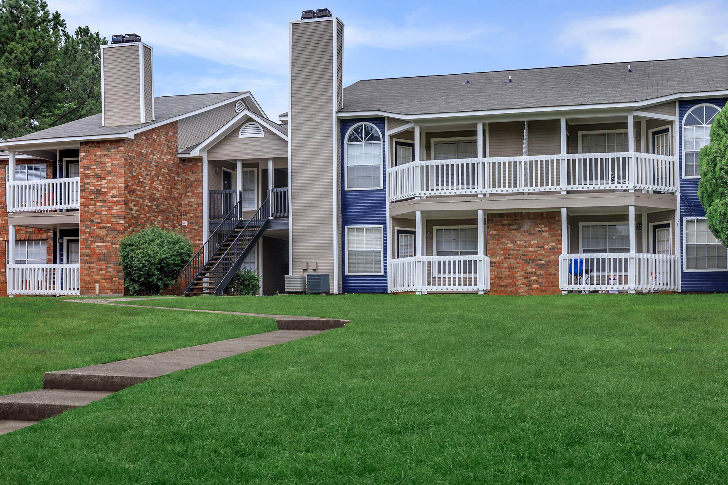 a large lawn in front of a house