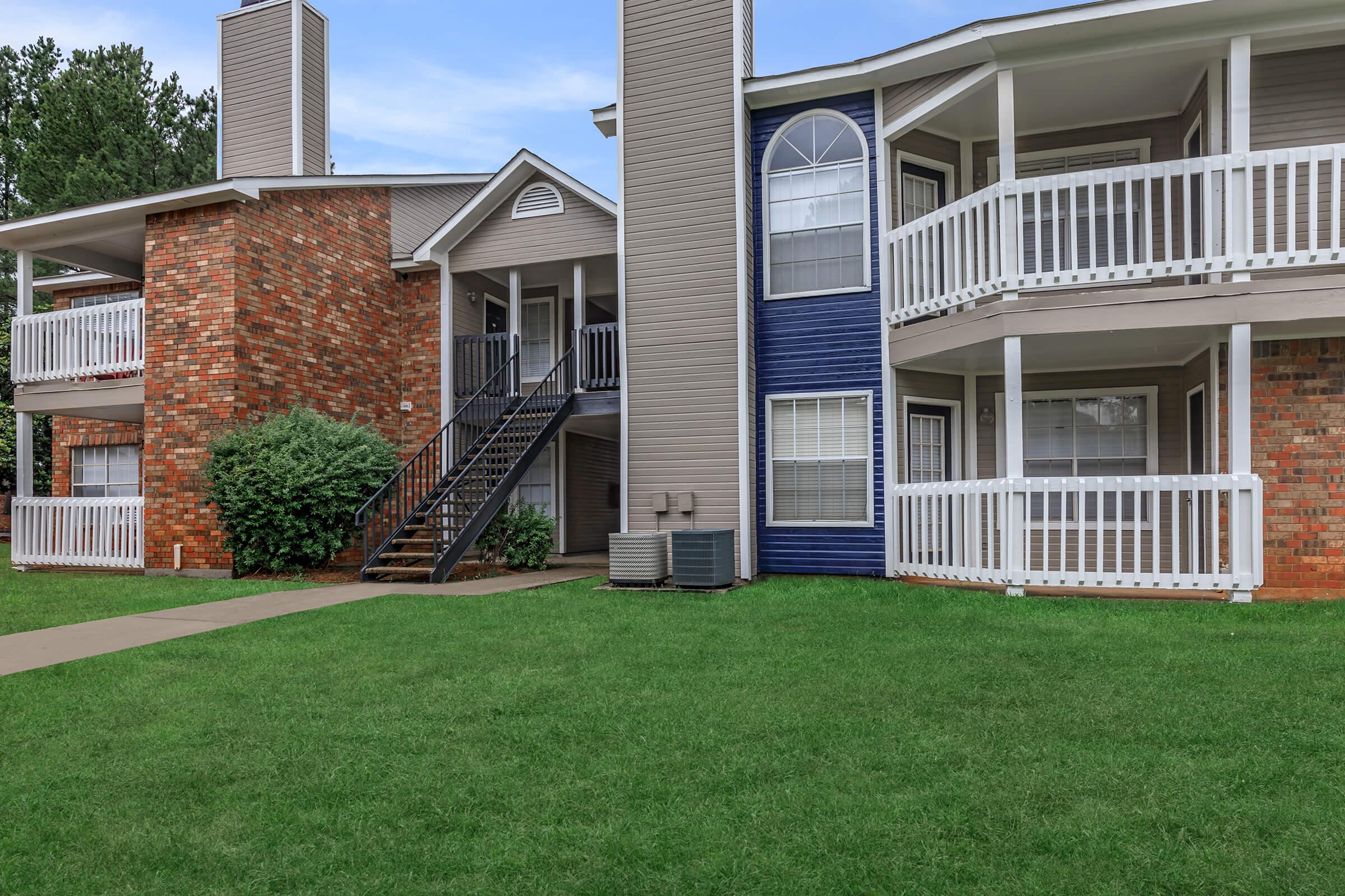 a large lawn in front of a house