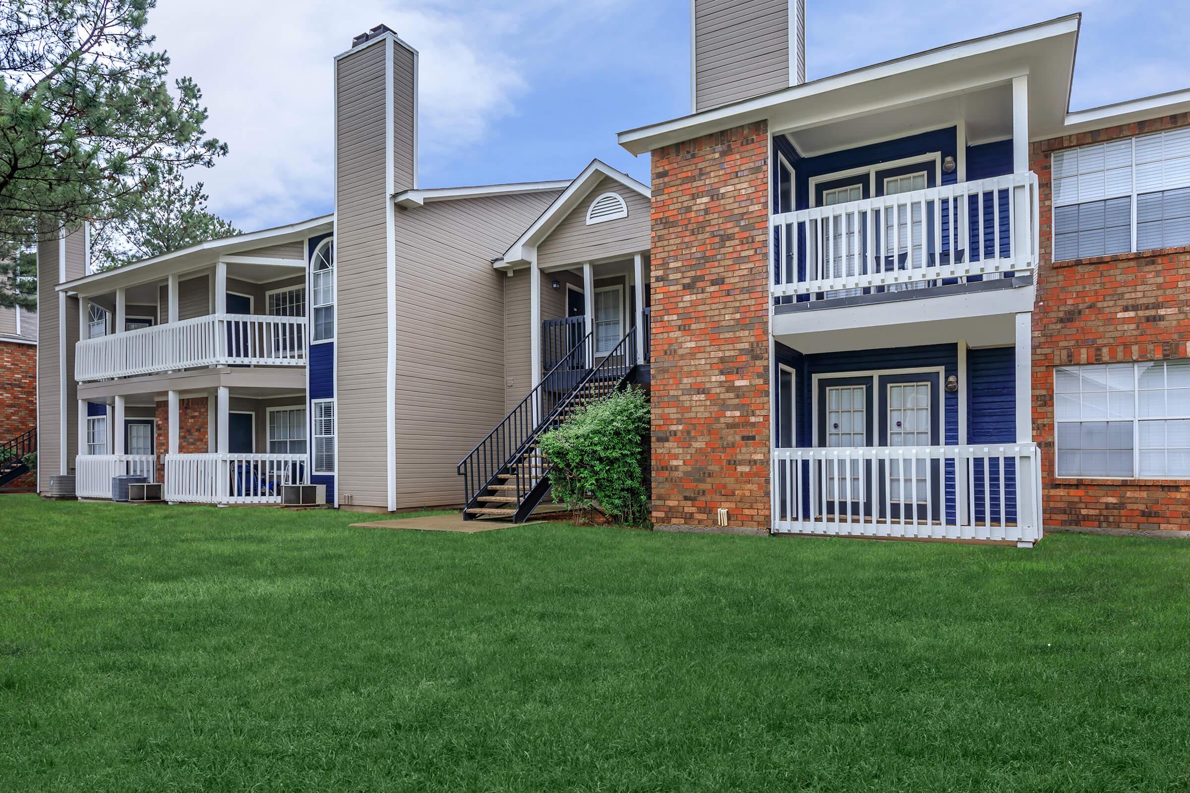 a large lawn in front of a house