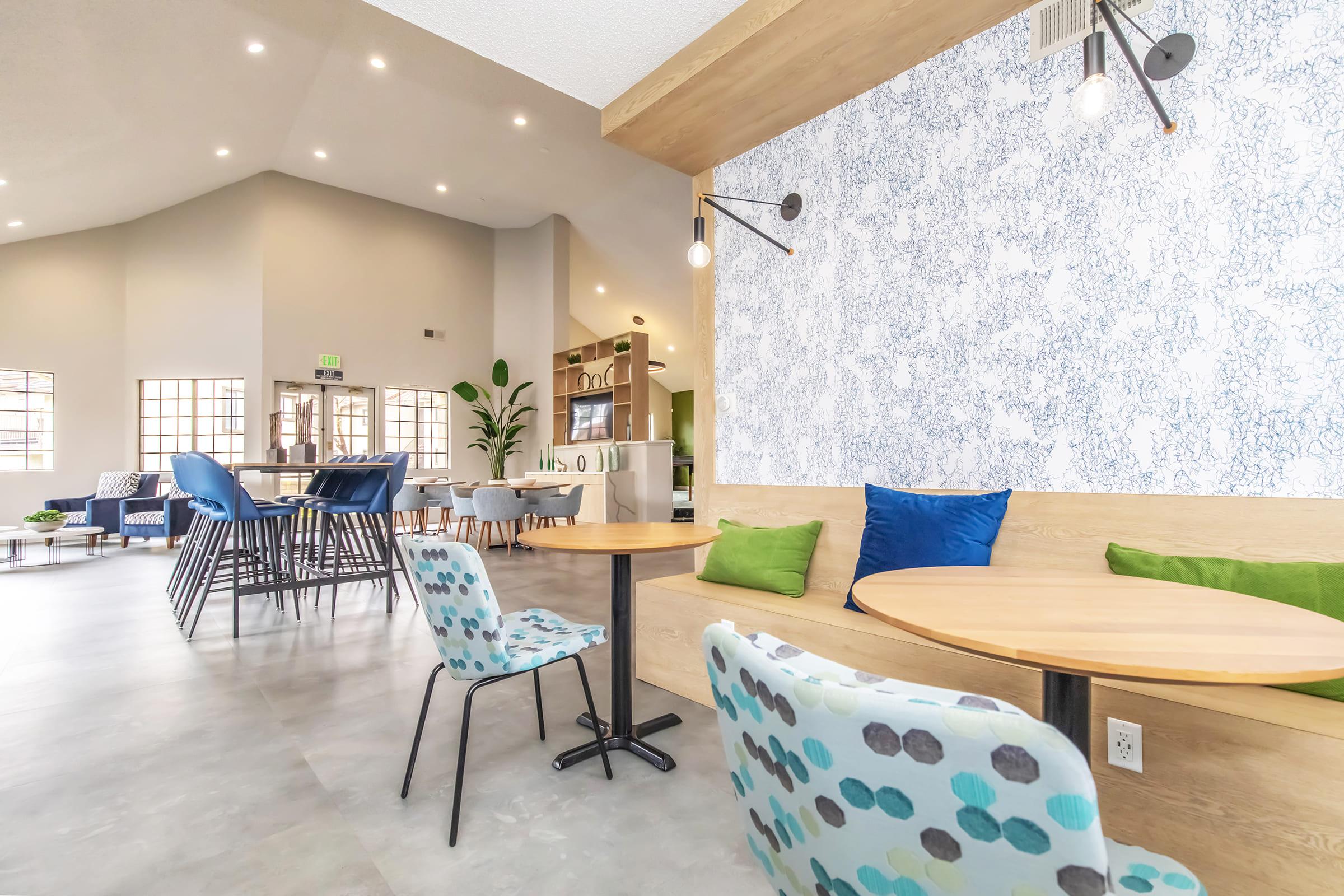 a living room filled with furniture and a table