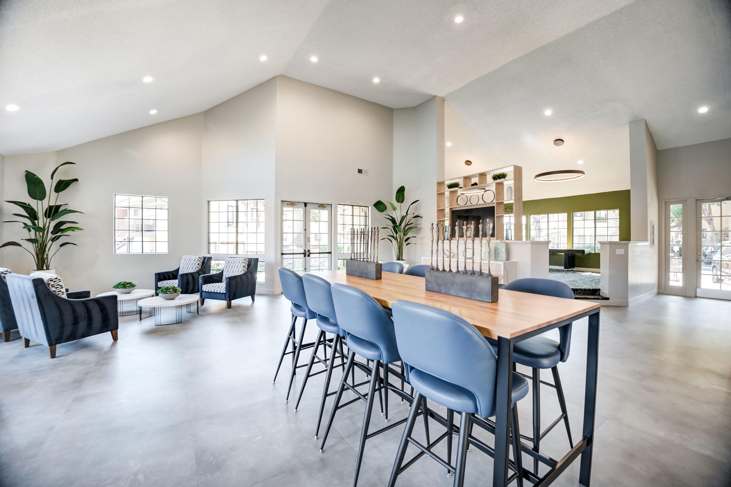 a room filled with furniture and a table