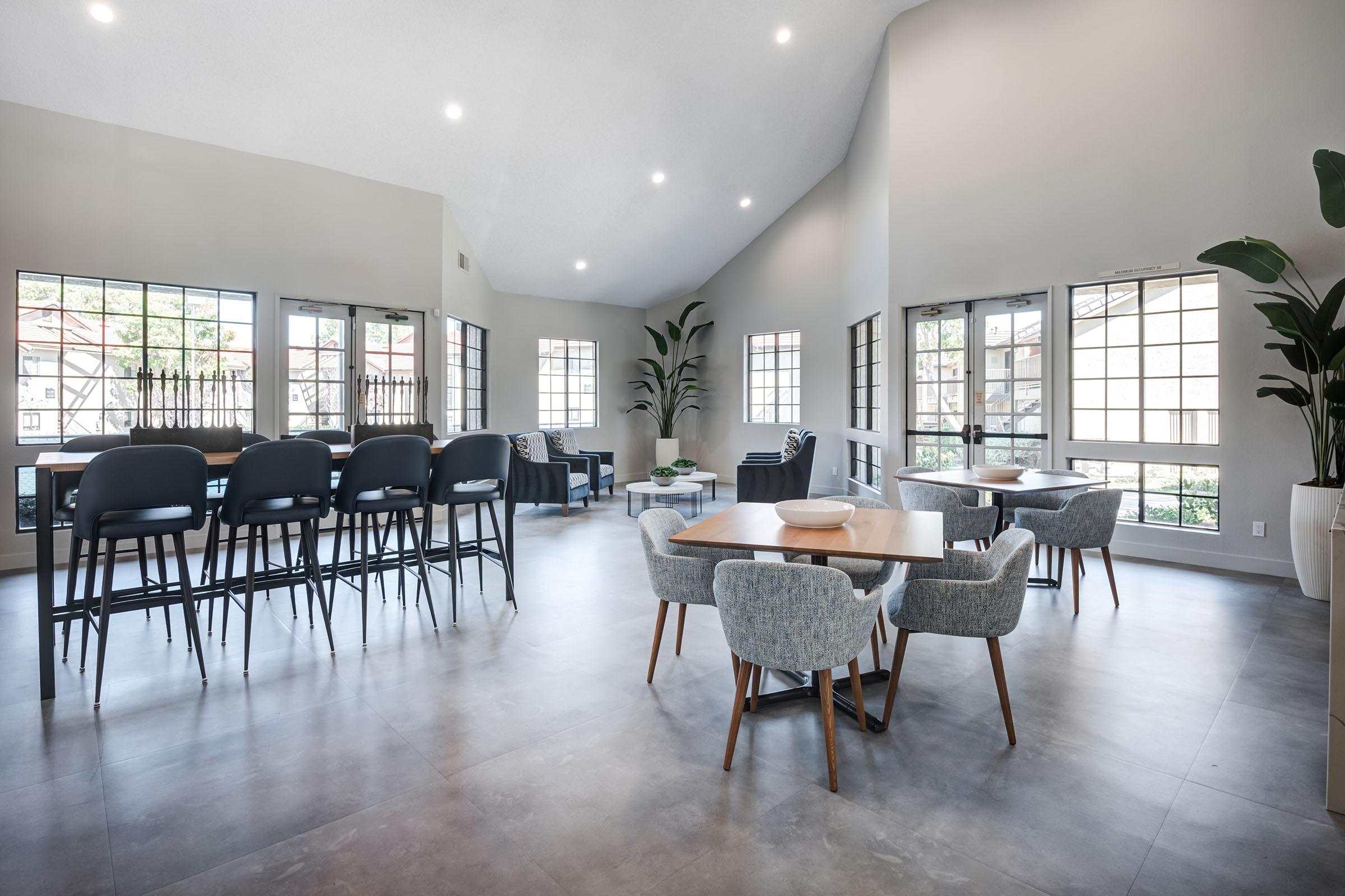 a room filled with furniture and a pool table