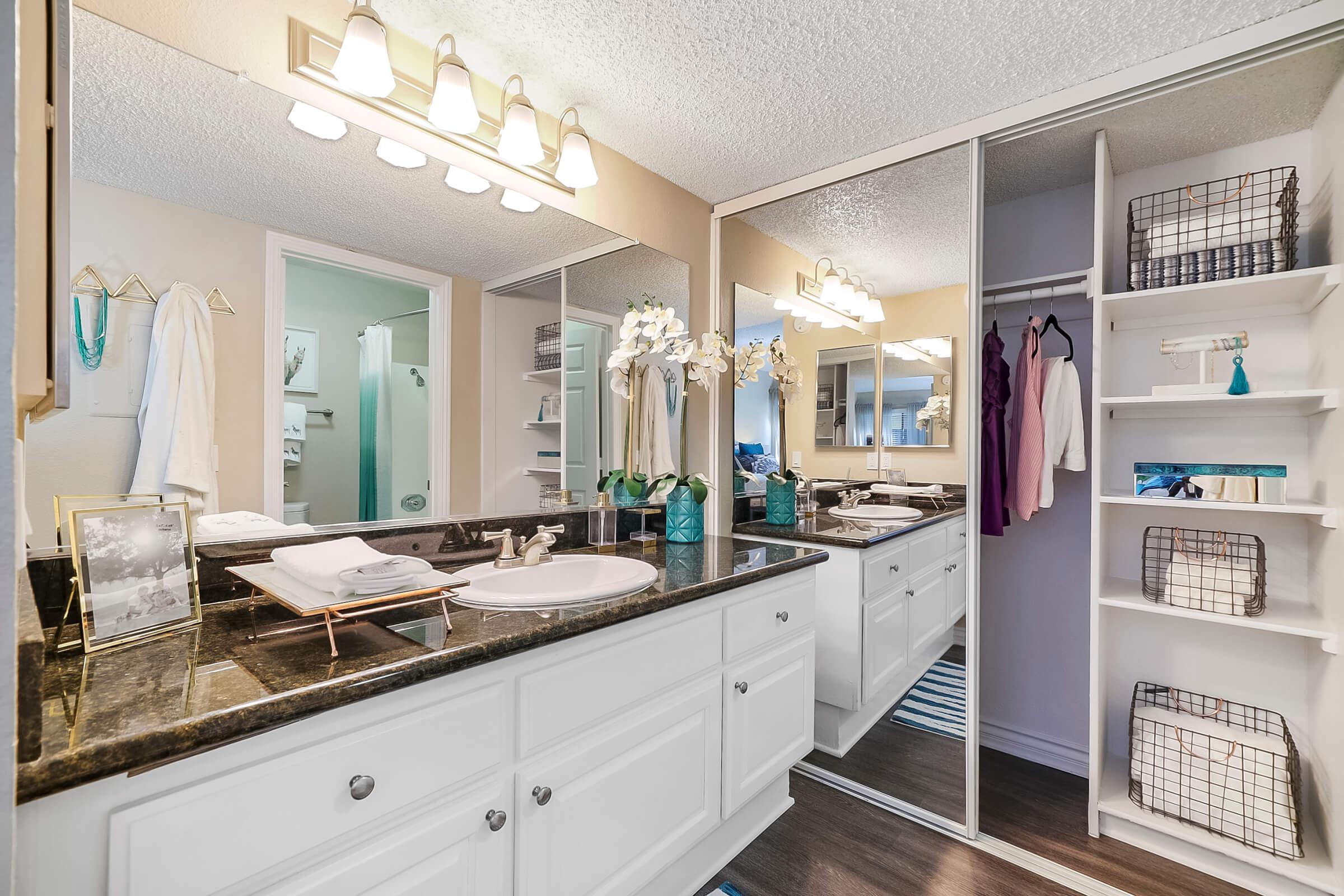 a kitchen with a sink and a refrigerator