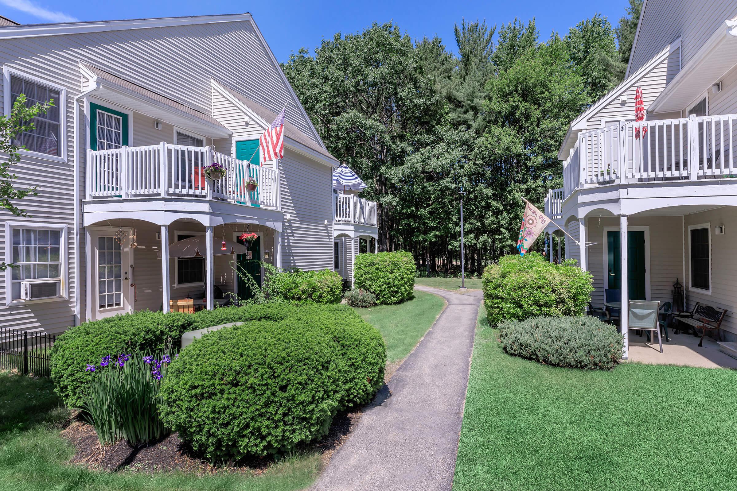 a large lawn in front of a house