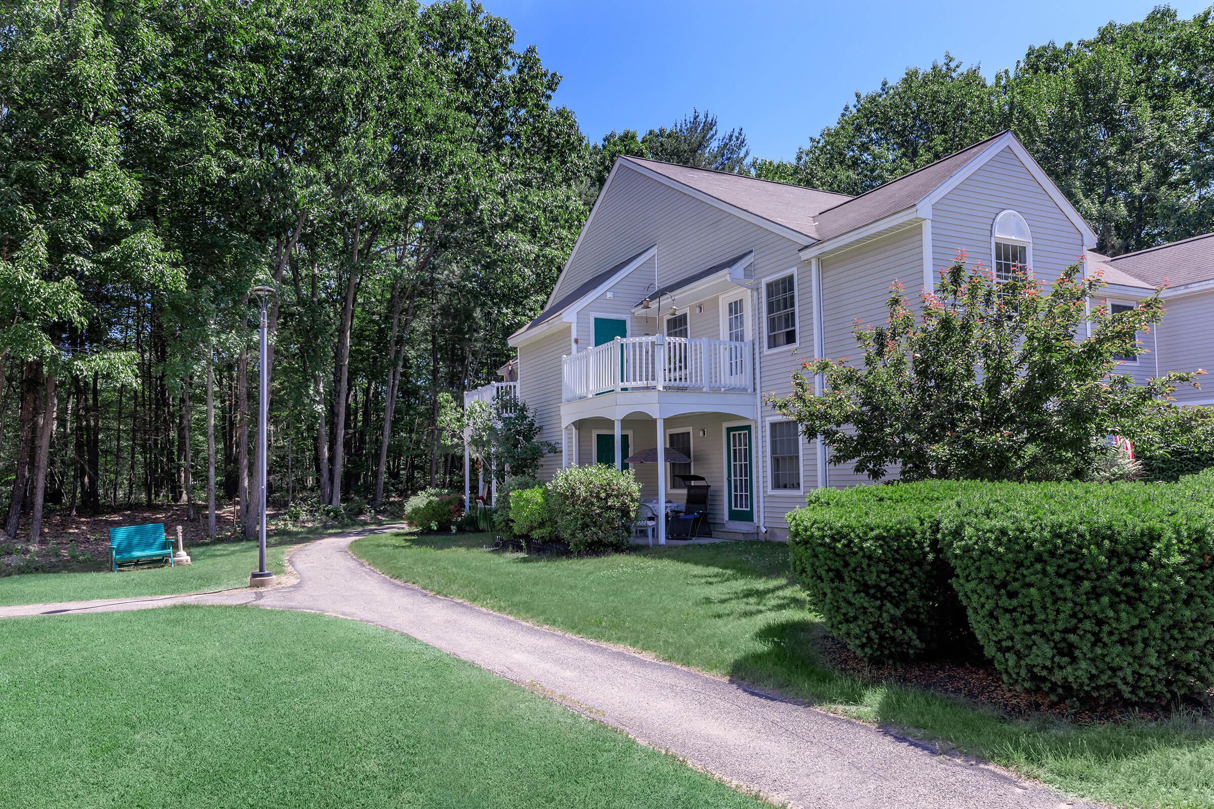 a large lawn in front of a house