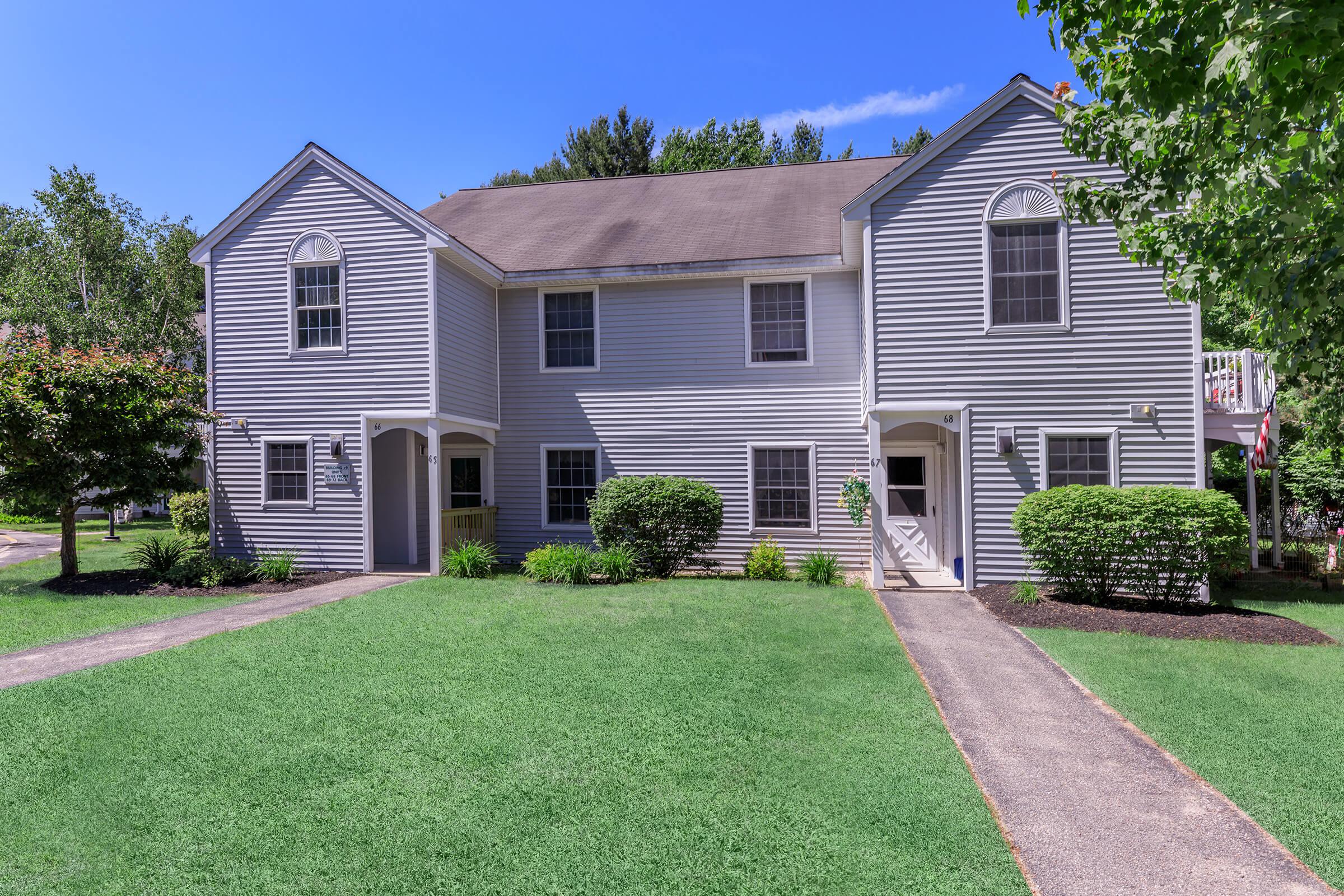 a large lawn in front of a house