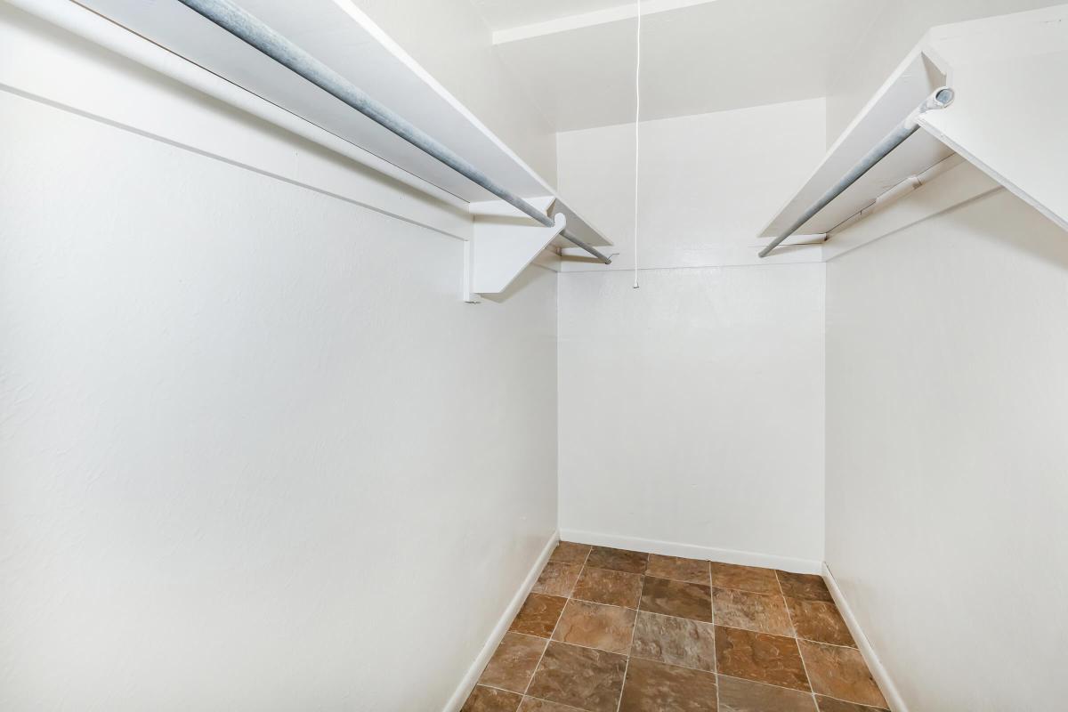 a white refrigerator freezer sitting inside of a kitchen