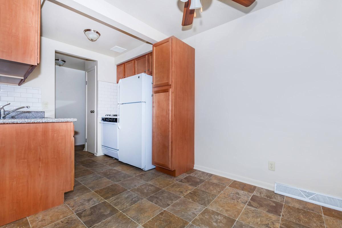 a kitchen with a wood floor