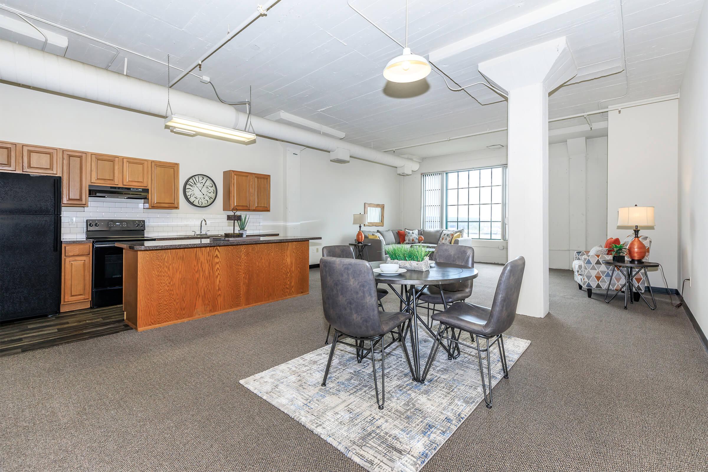 a room filled with furniture and a rug