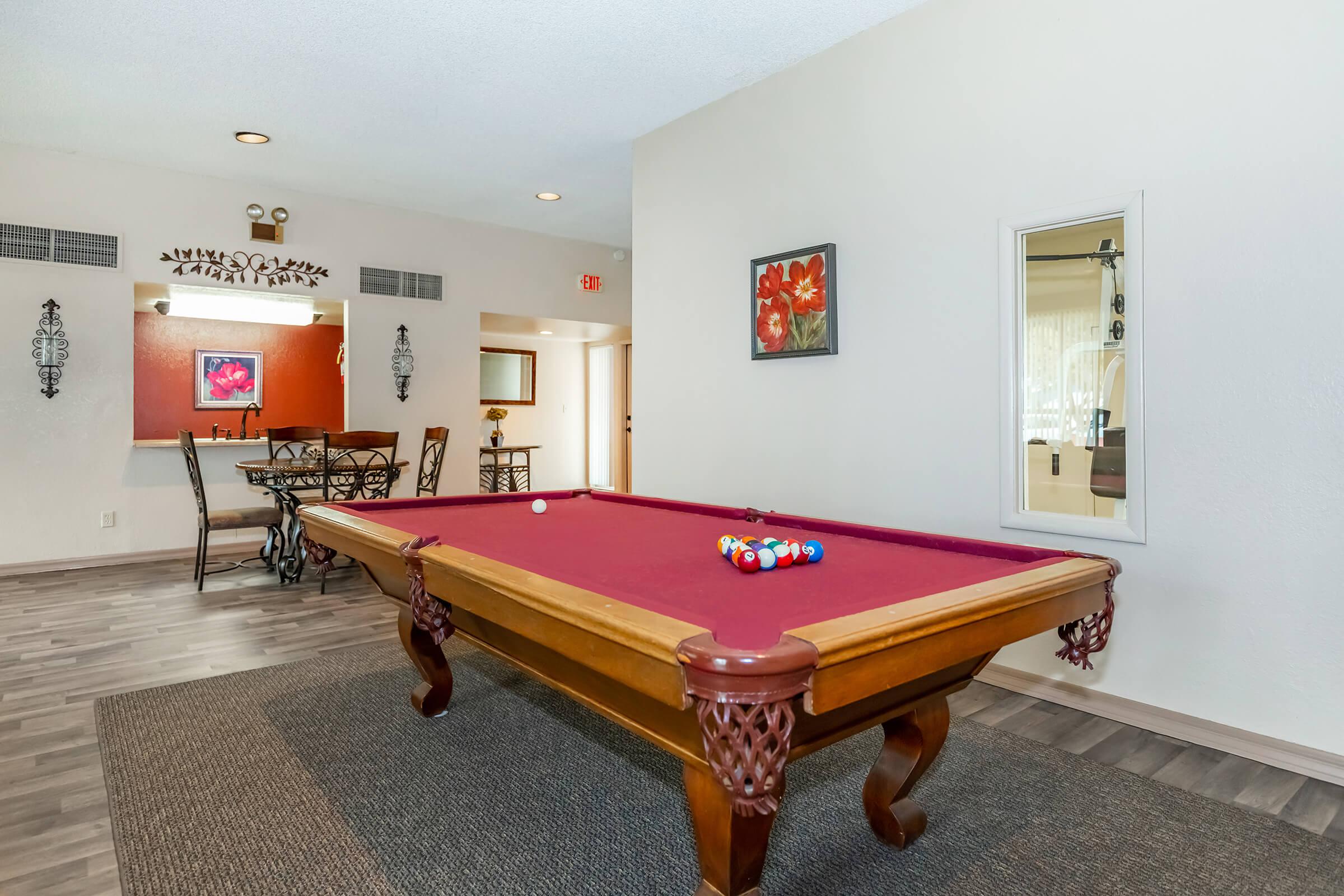 a living room with a wooden floor