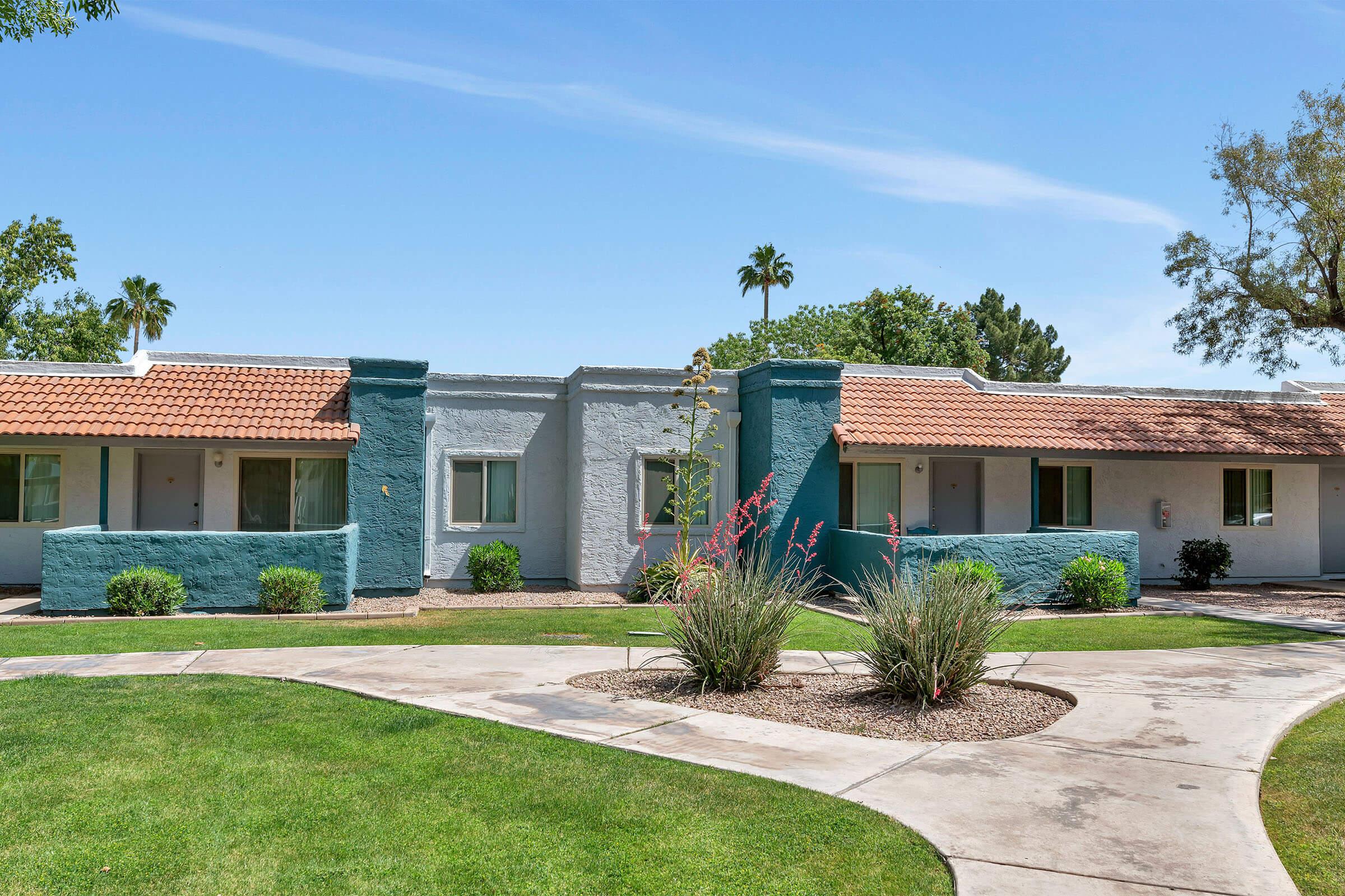 a large lawn in front of a house