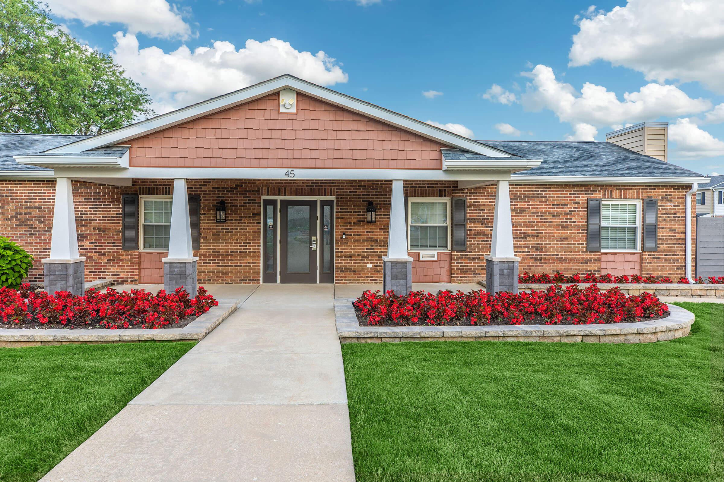 a large lawn in front of a house