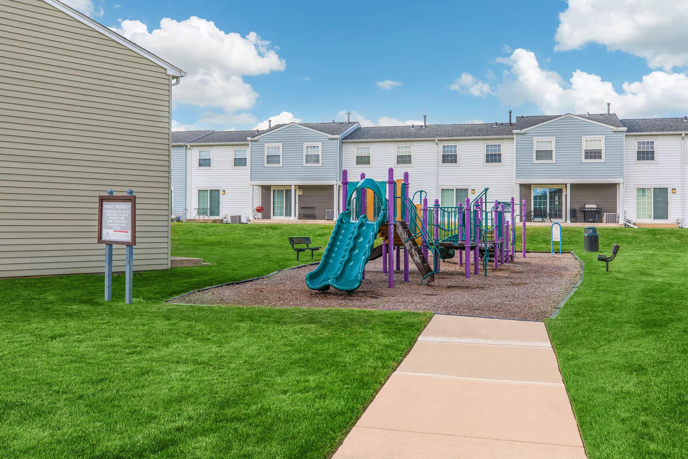 a large lawn in front of a building