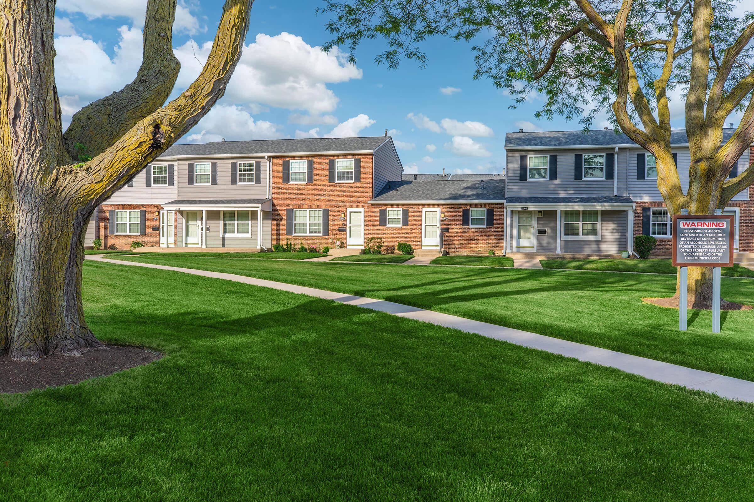 a large lawn in front of a house