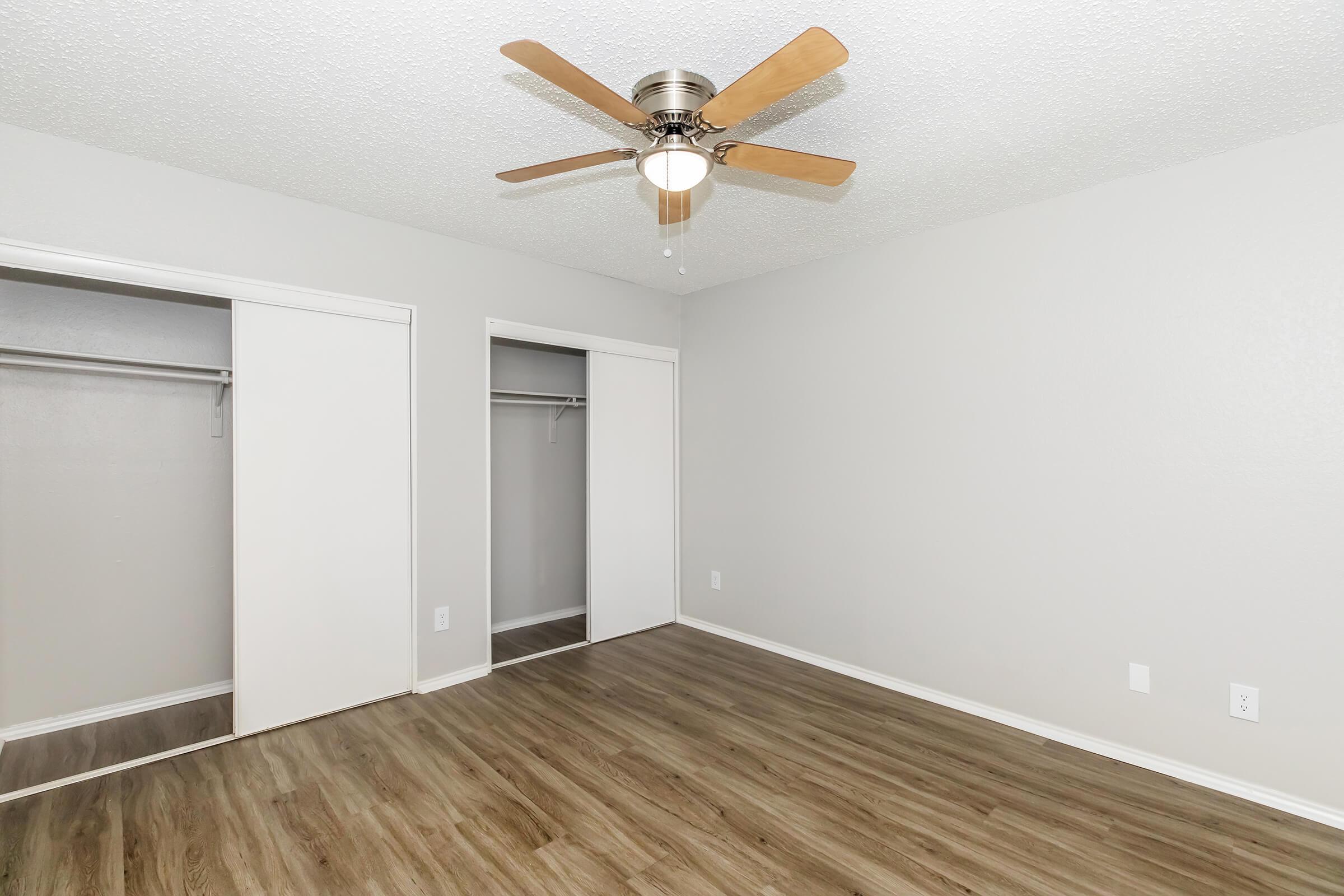 a kitchen with a wood floor