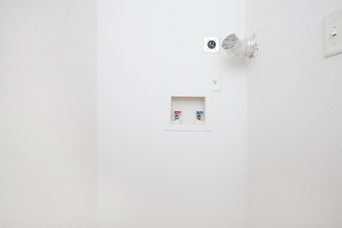 a white refrigerator freezer sitting in a room