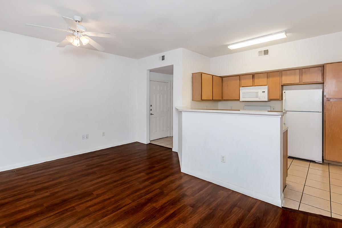 a white refrigerator freezer sitting inside of a kitchen