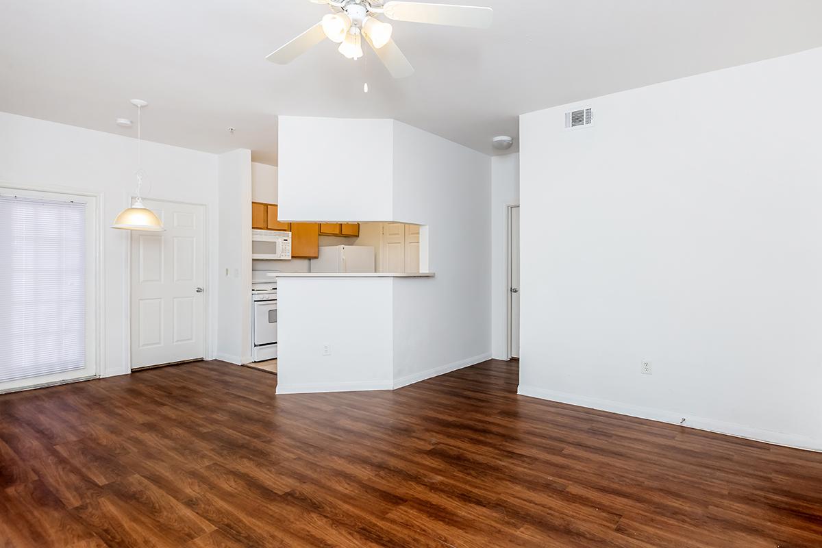 a kitchen with a wood floor