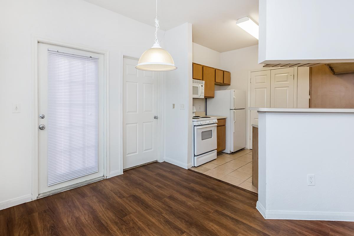 a white refrigerator freezer sitting in a room