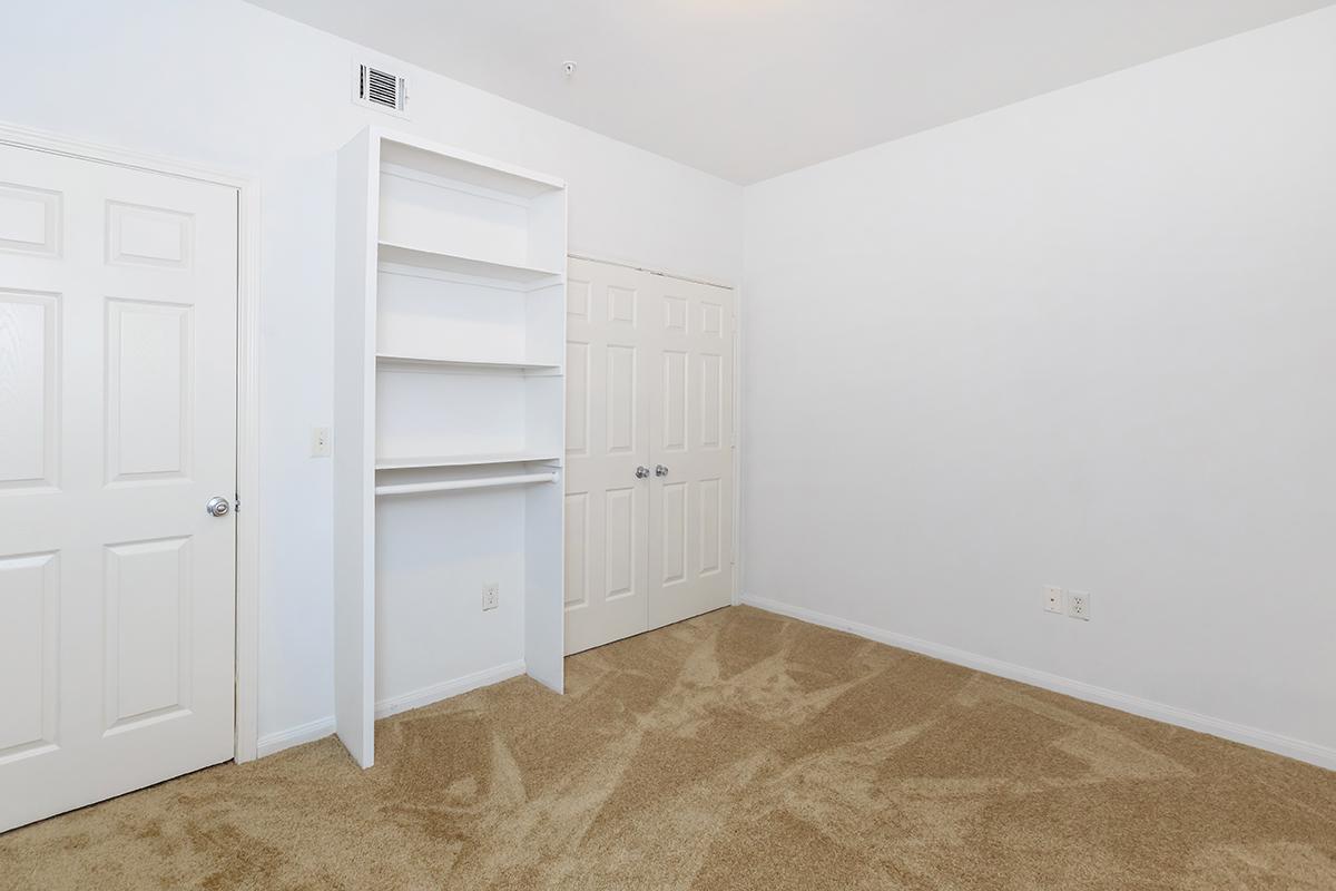 a white refrigerator freezer sitting in a room