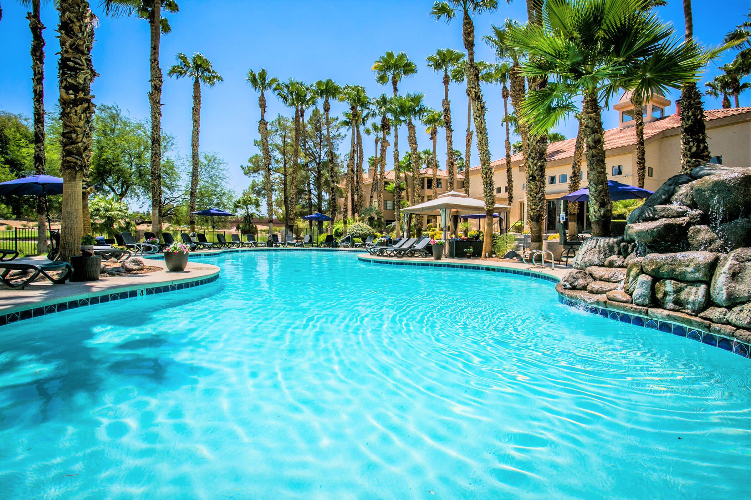 a pool next to a body of water