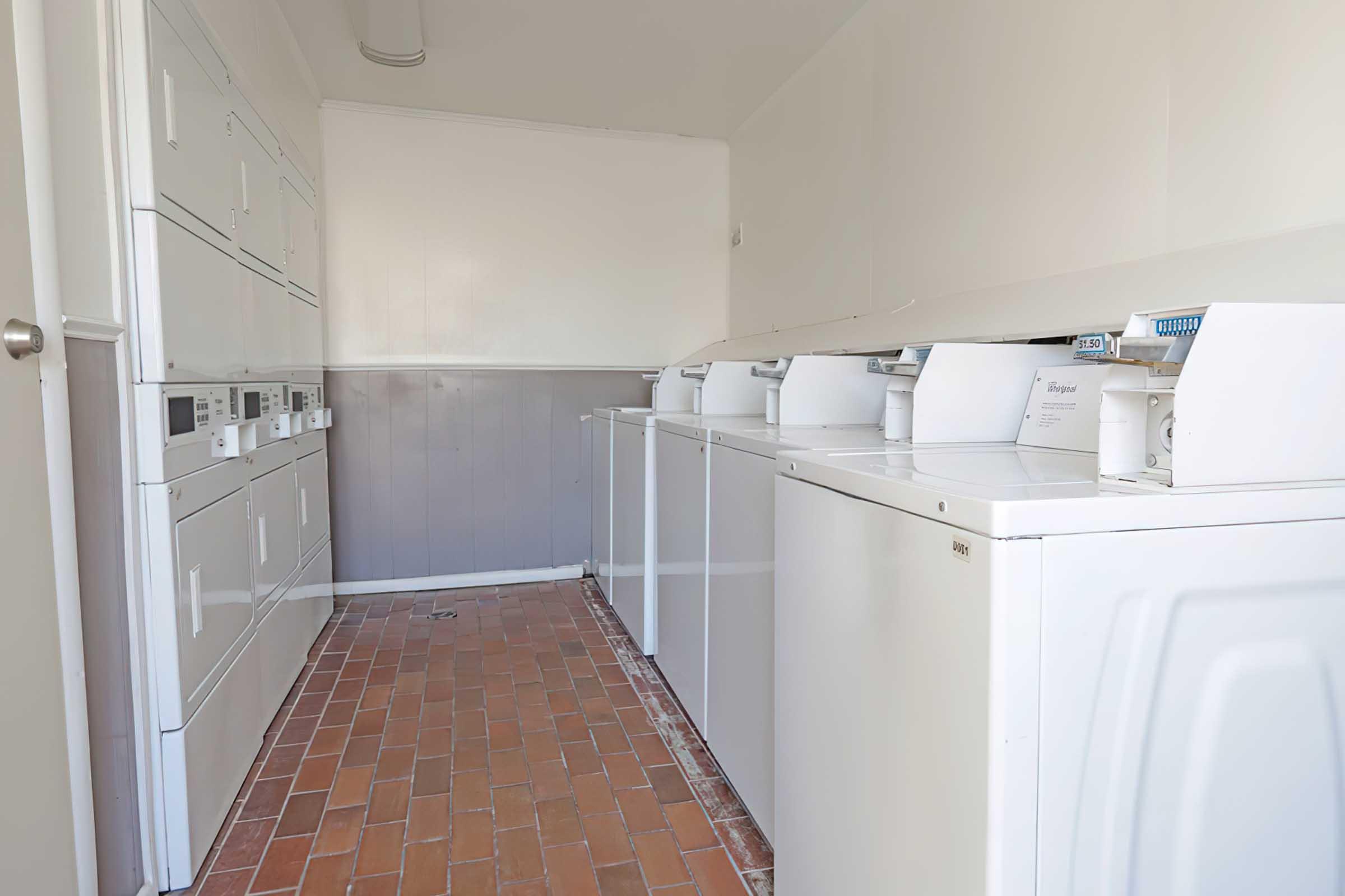 a kitchen with a tile floor