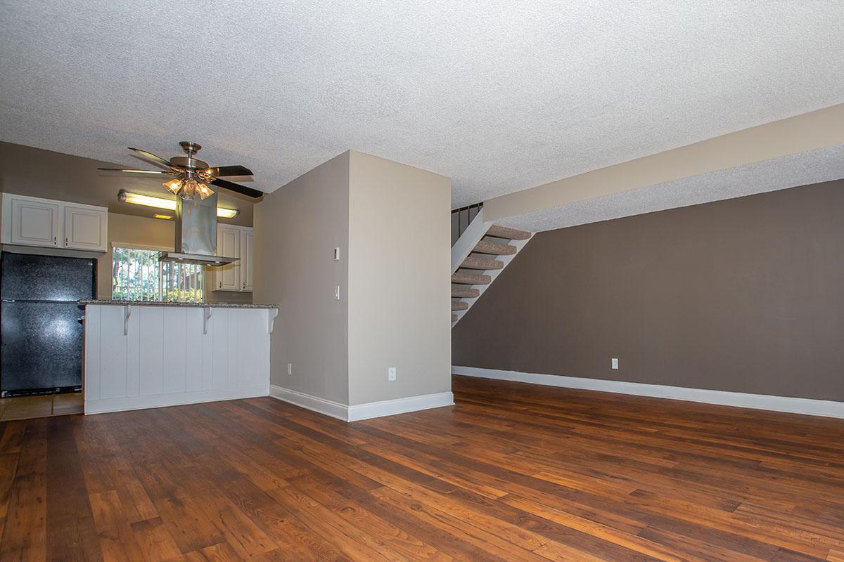 a kitchen with a wood floor