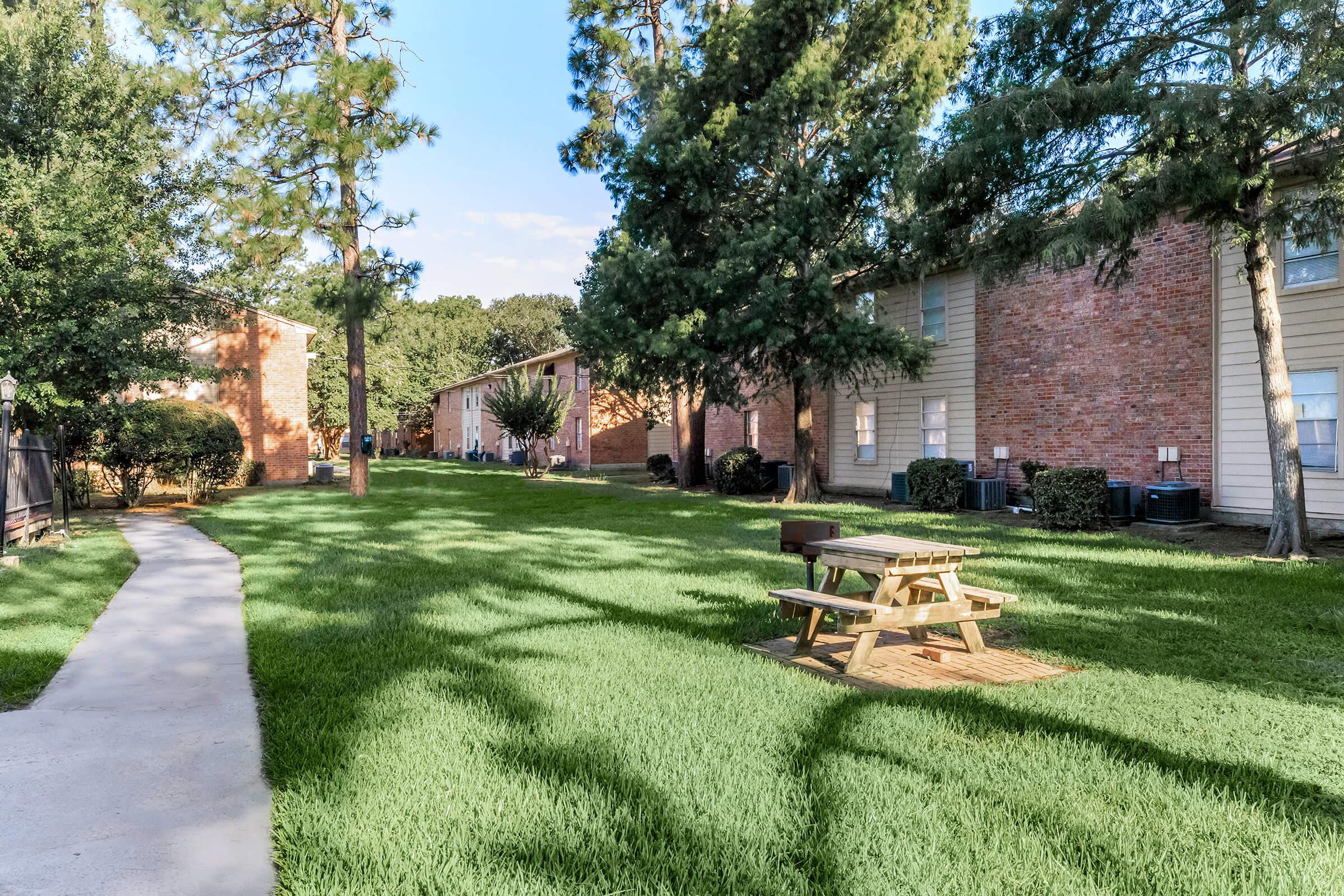 a large lawn in front of a house