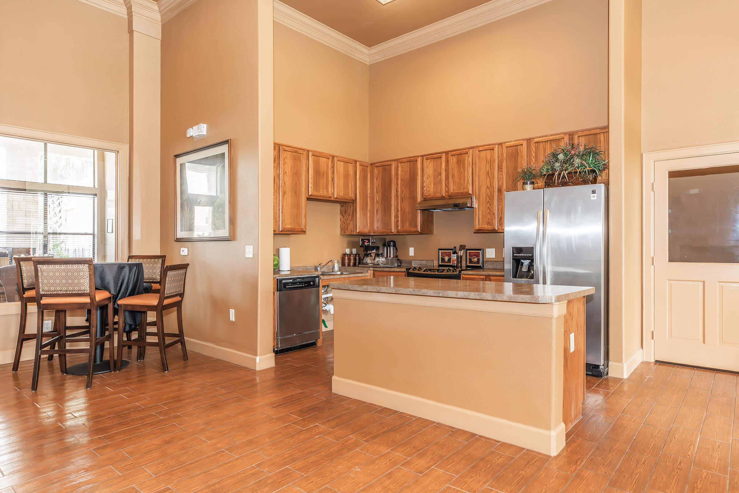 a room filled with furniture and a large window