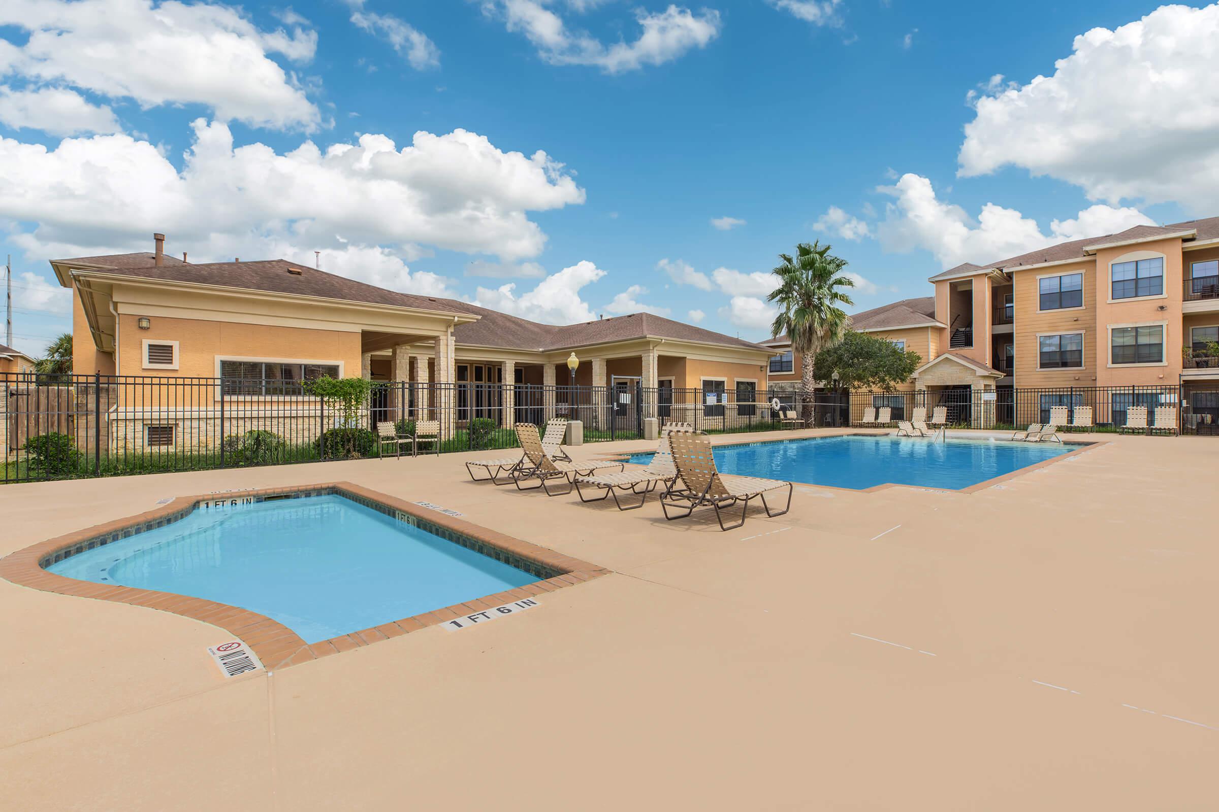 a pool next to a building