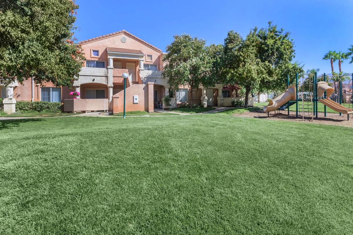 a large lawn in front of a house