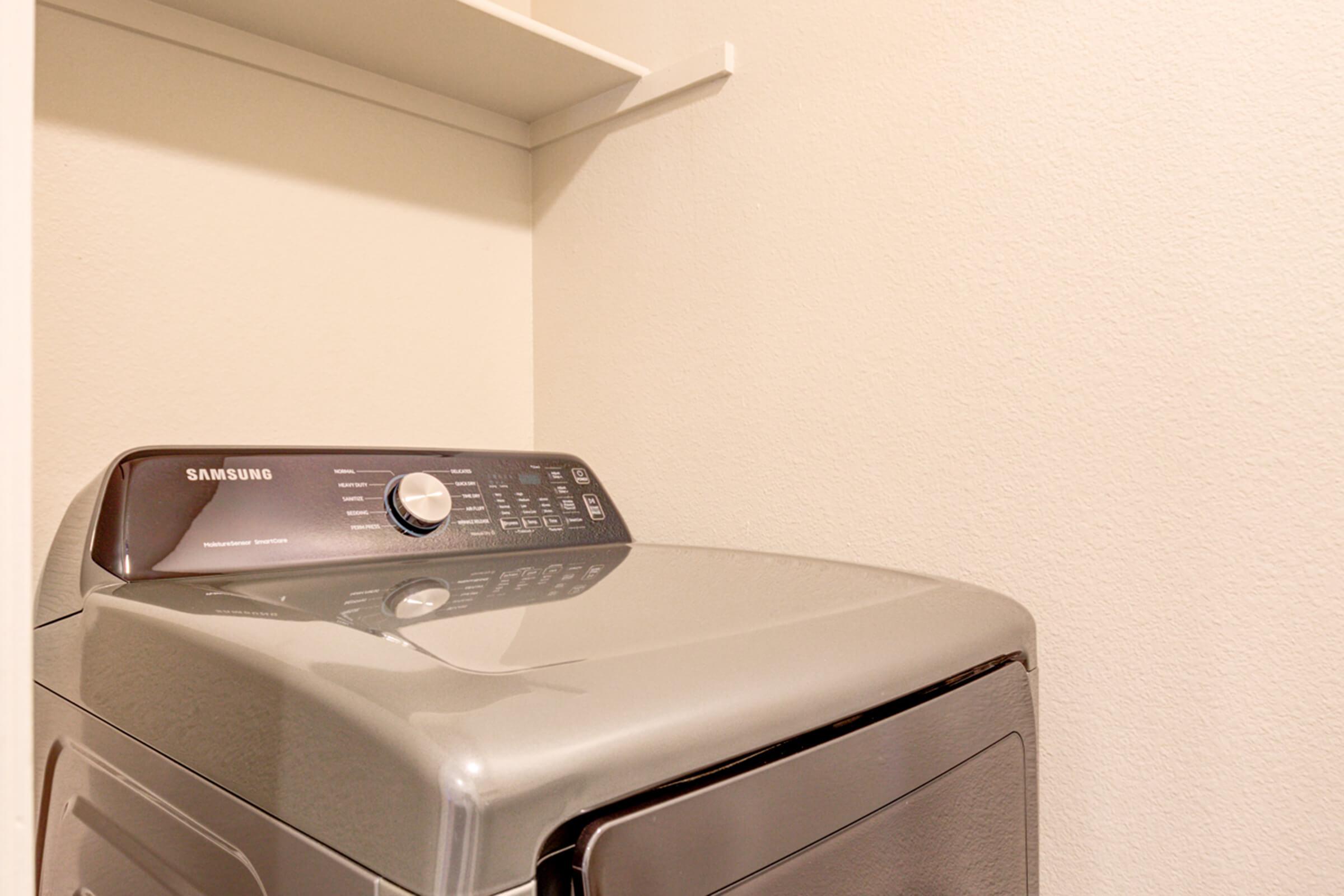 a toaster oven sitting on top of a microwave