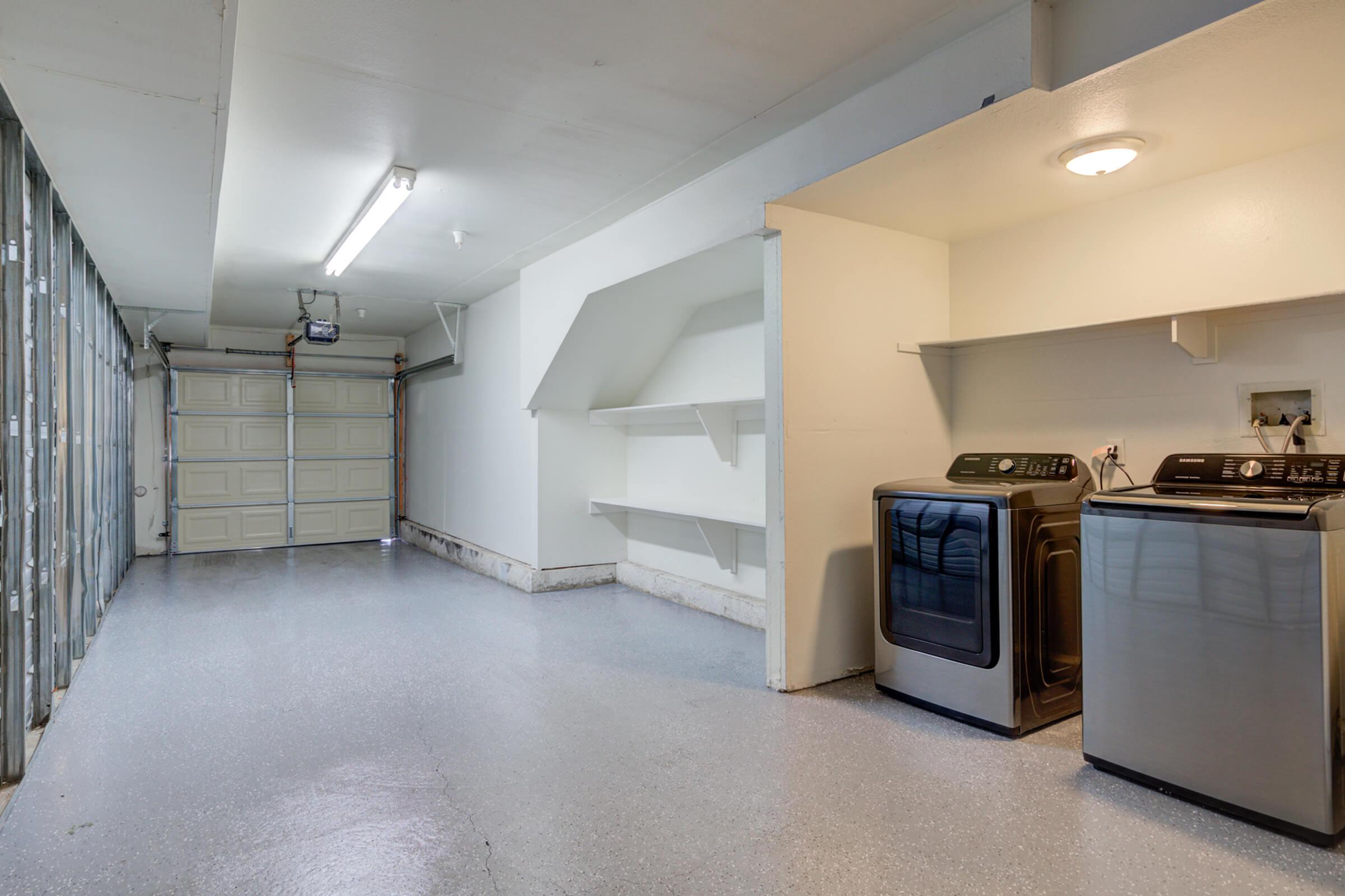 a kitchen with a refrigerator in a room
