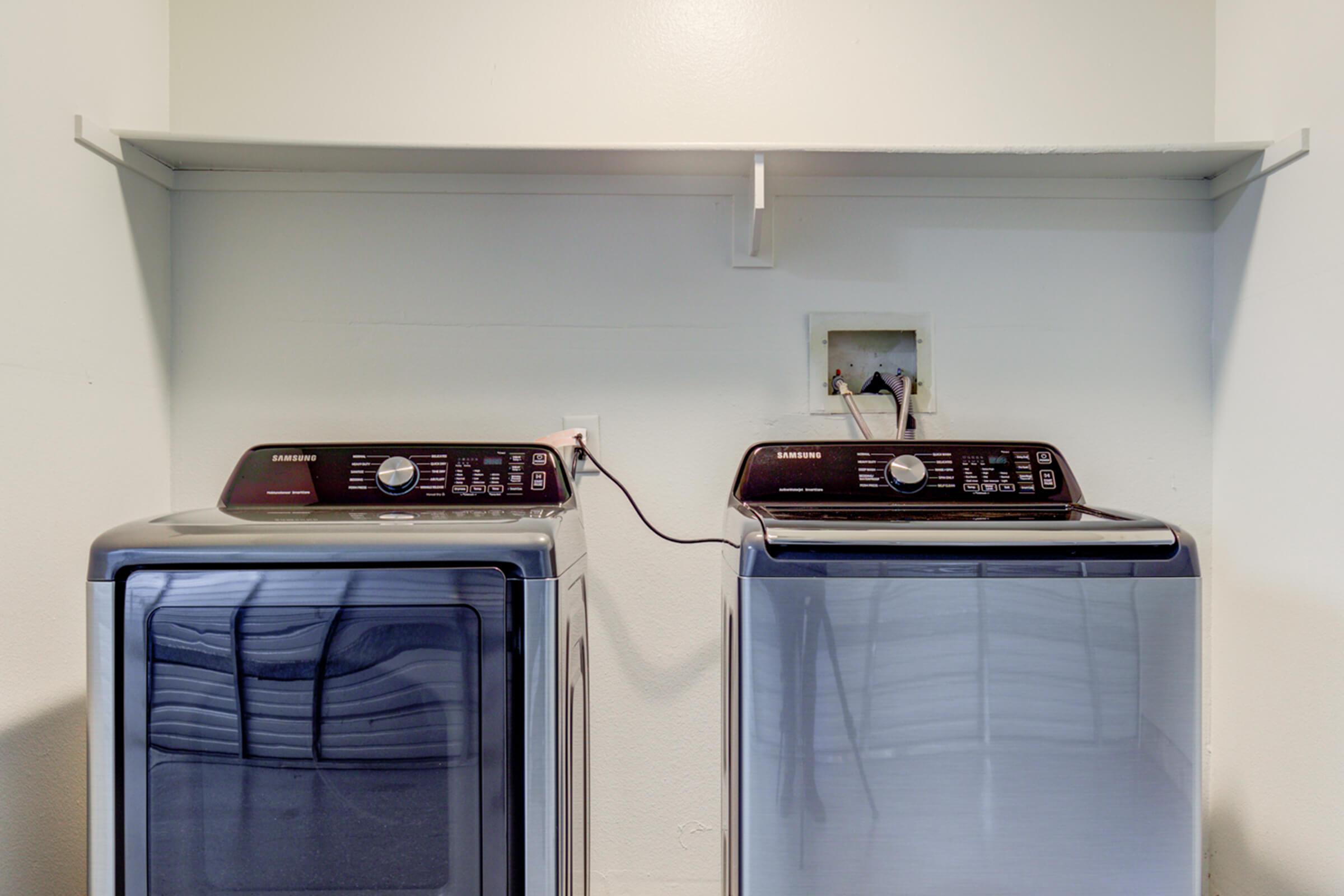 a microwave oven sitting on top of a stove