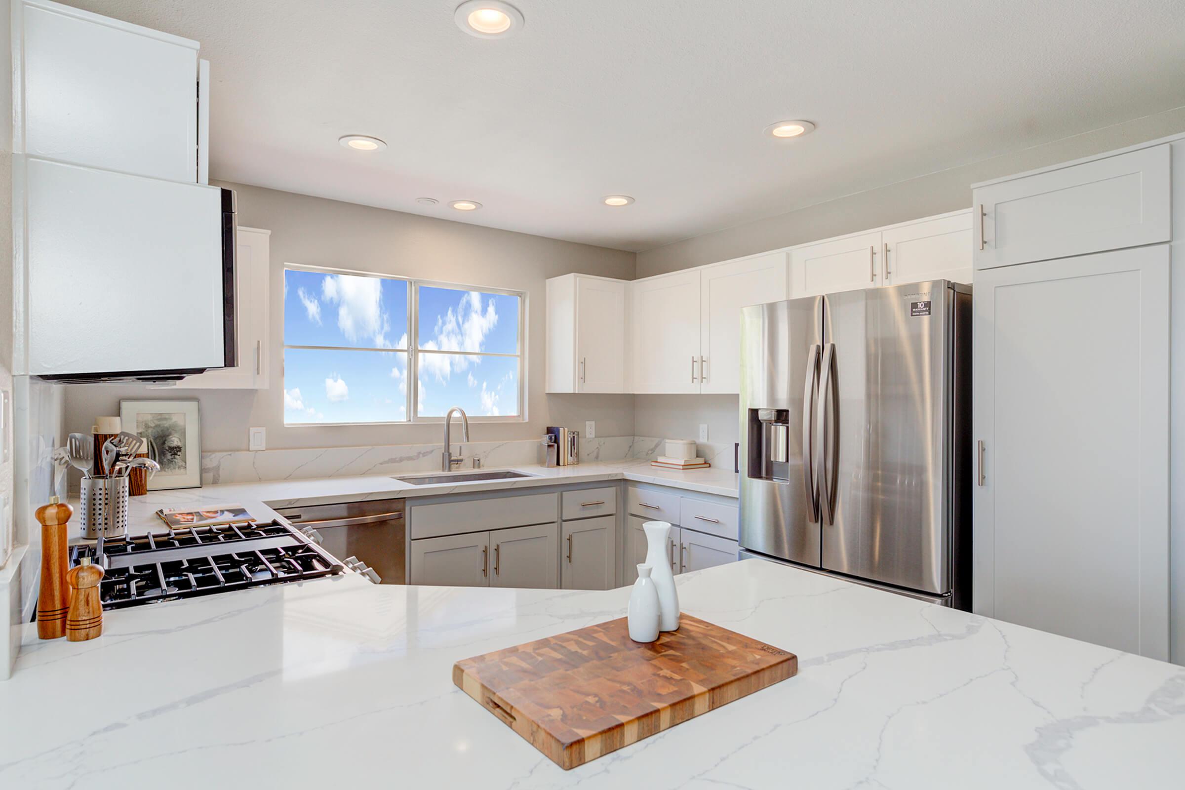 a kitchen with a sink and a window