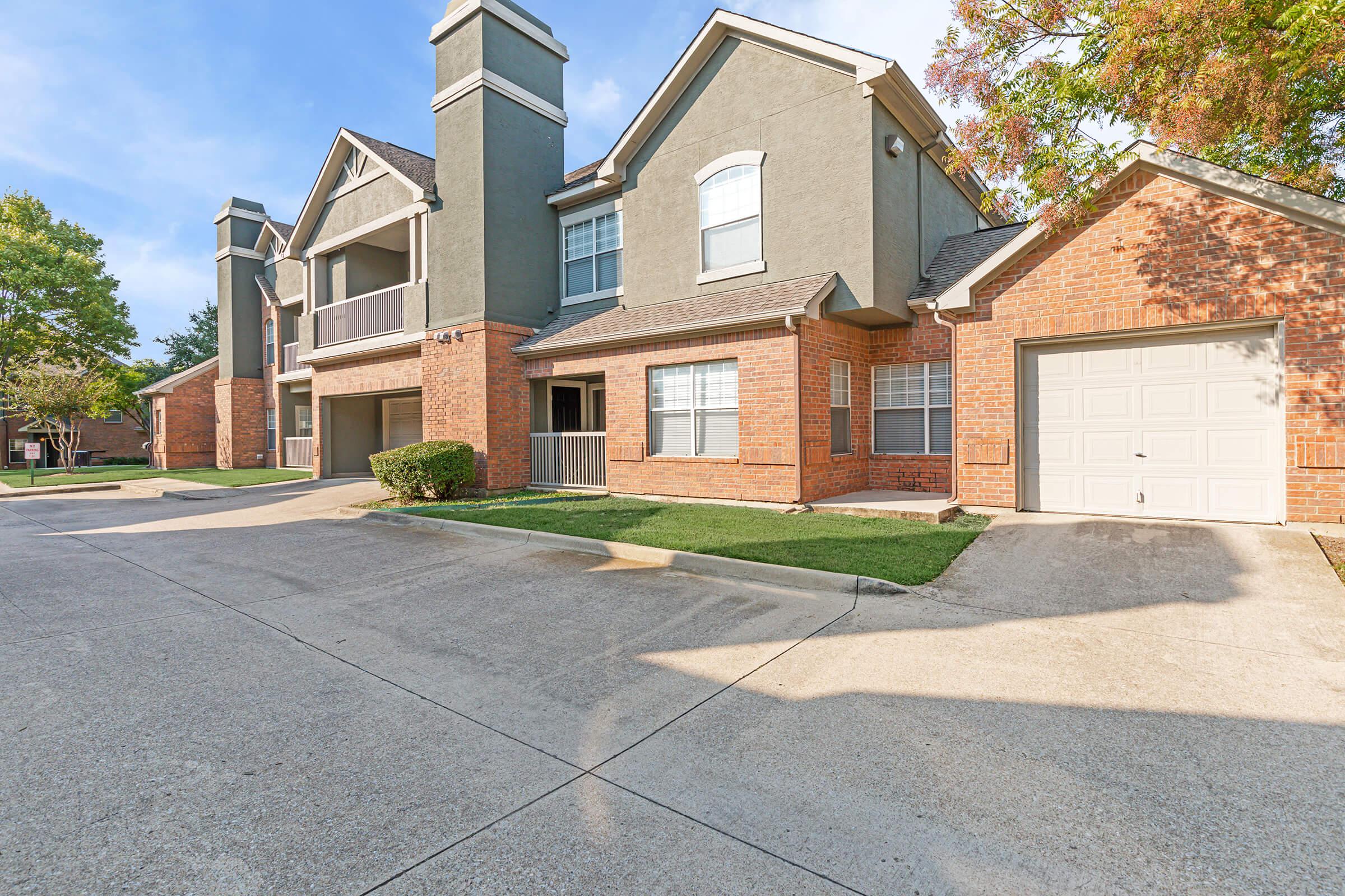 Villages at Clear Springs community building with attached garages