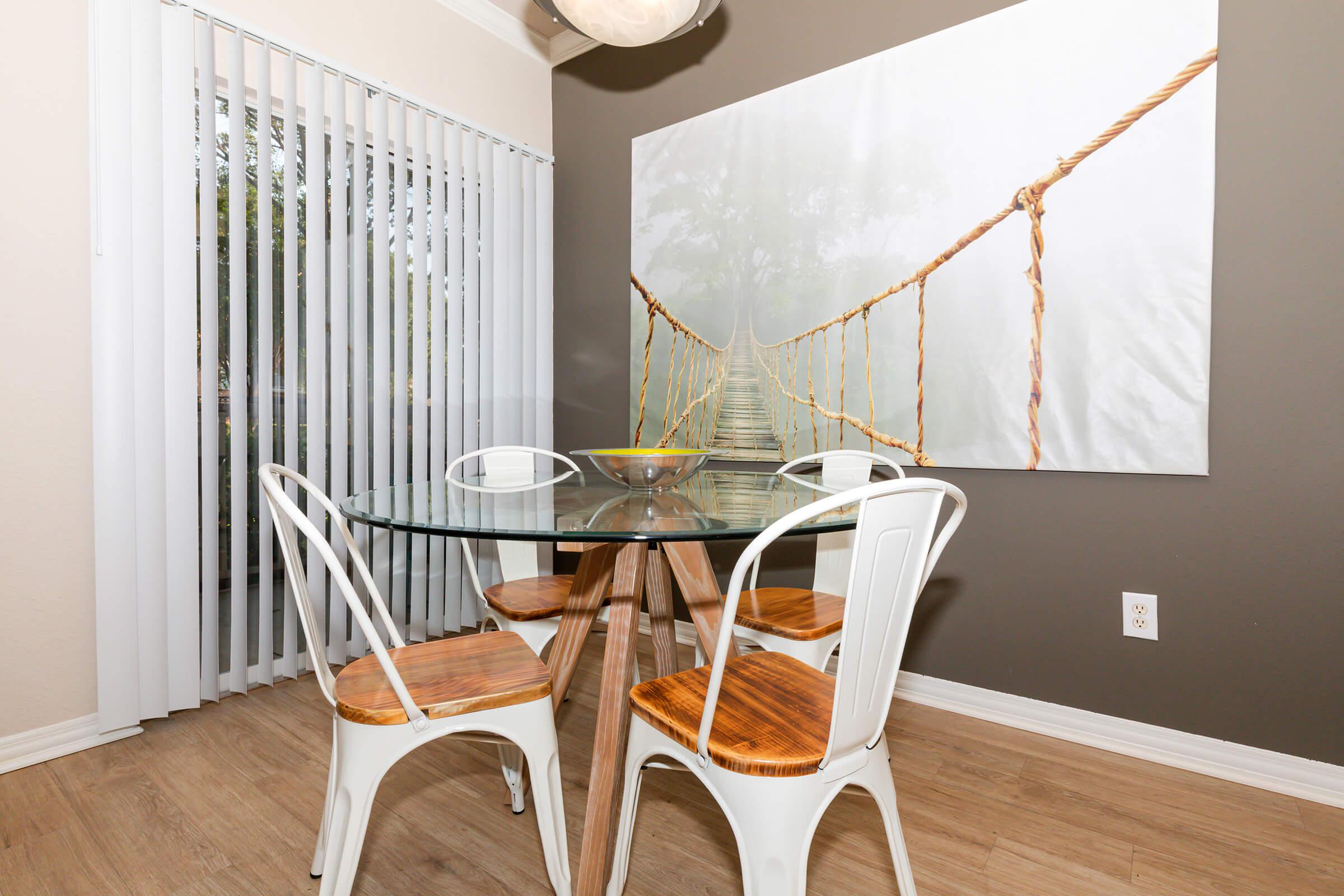 furnished dining room with sliding glass doors