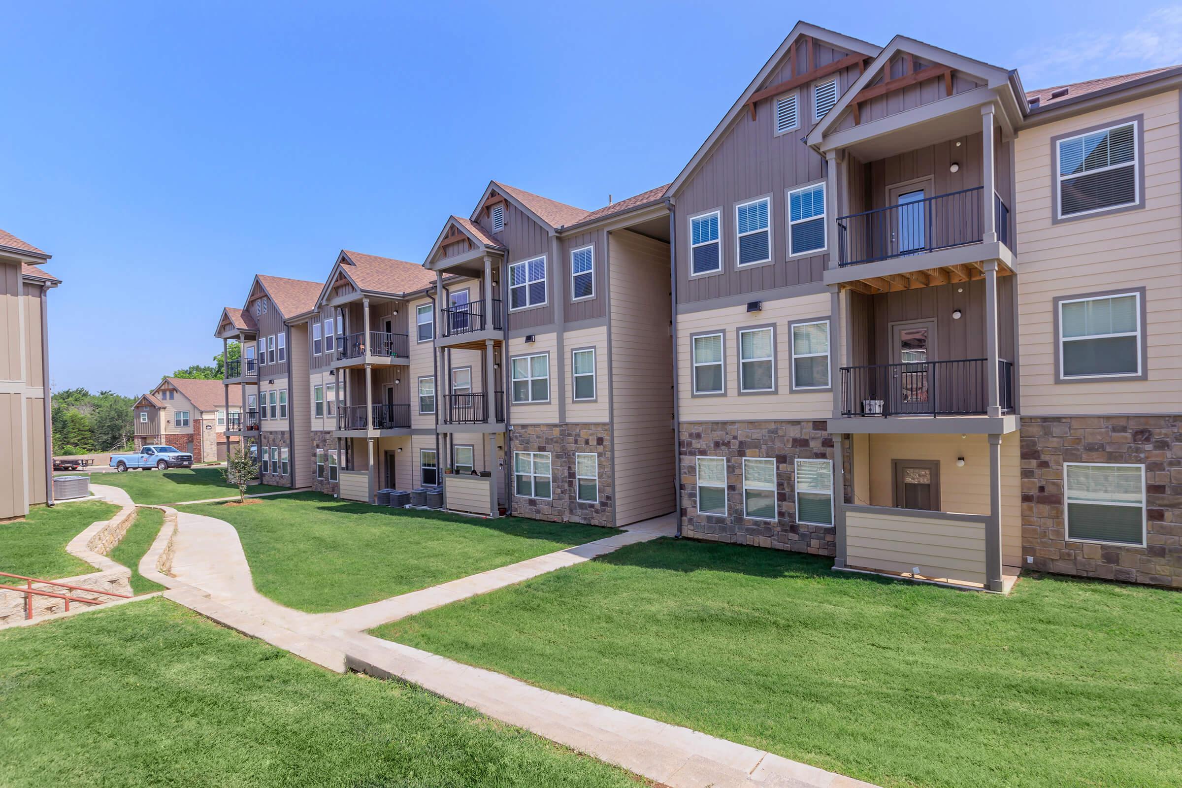 a large lawn in front of a building