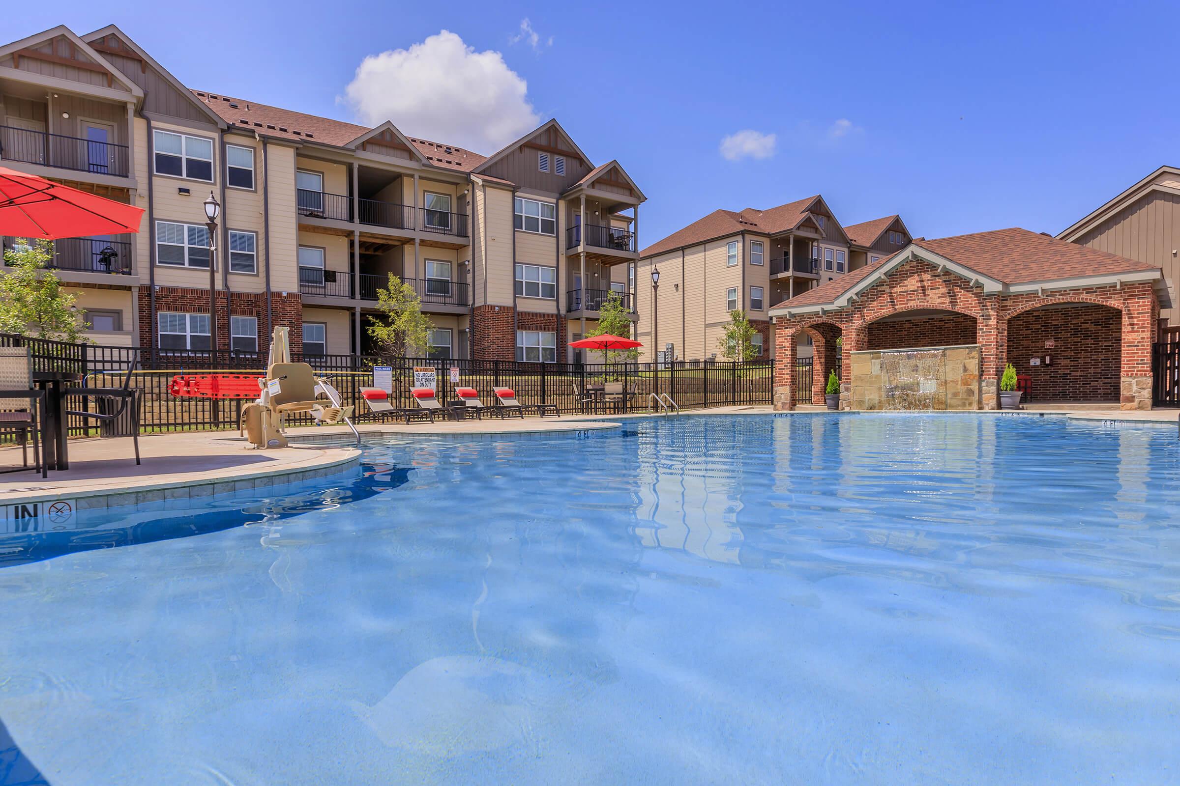 a house with a large pool of water